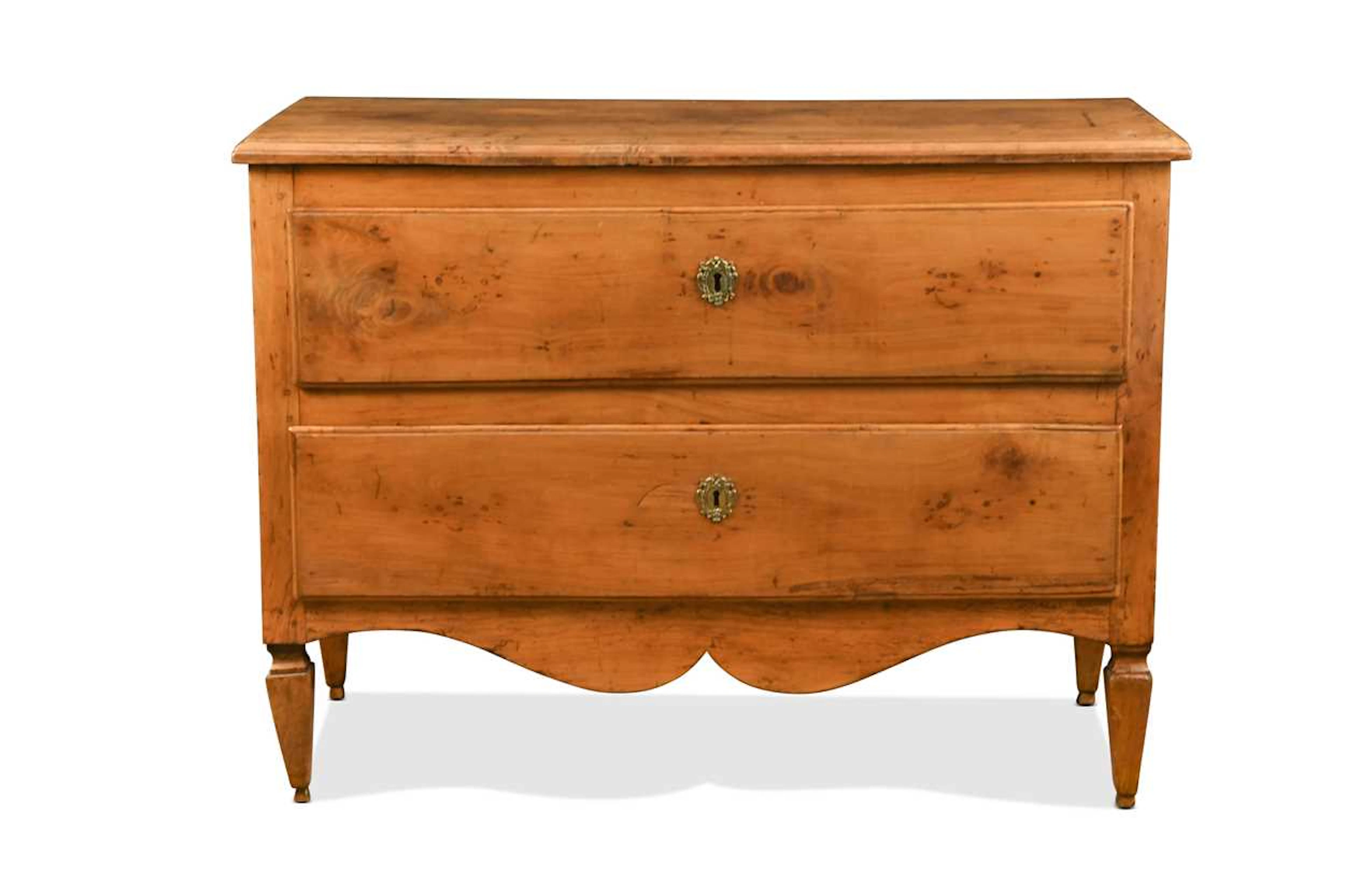 A French fruitwood commode chest, 18th century