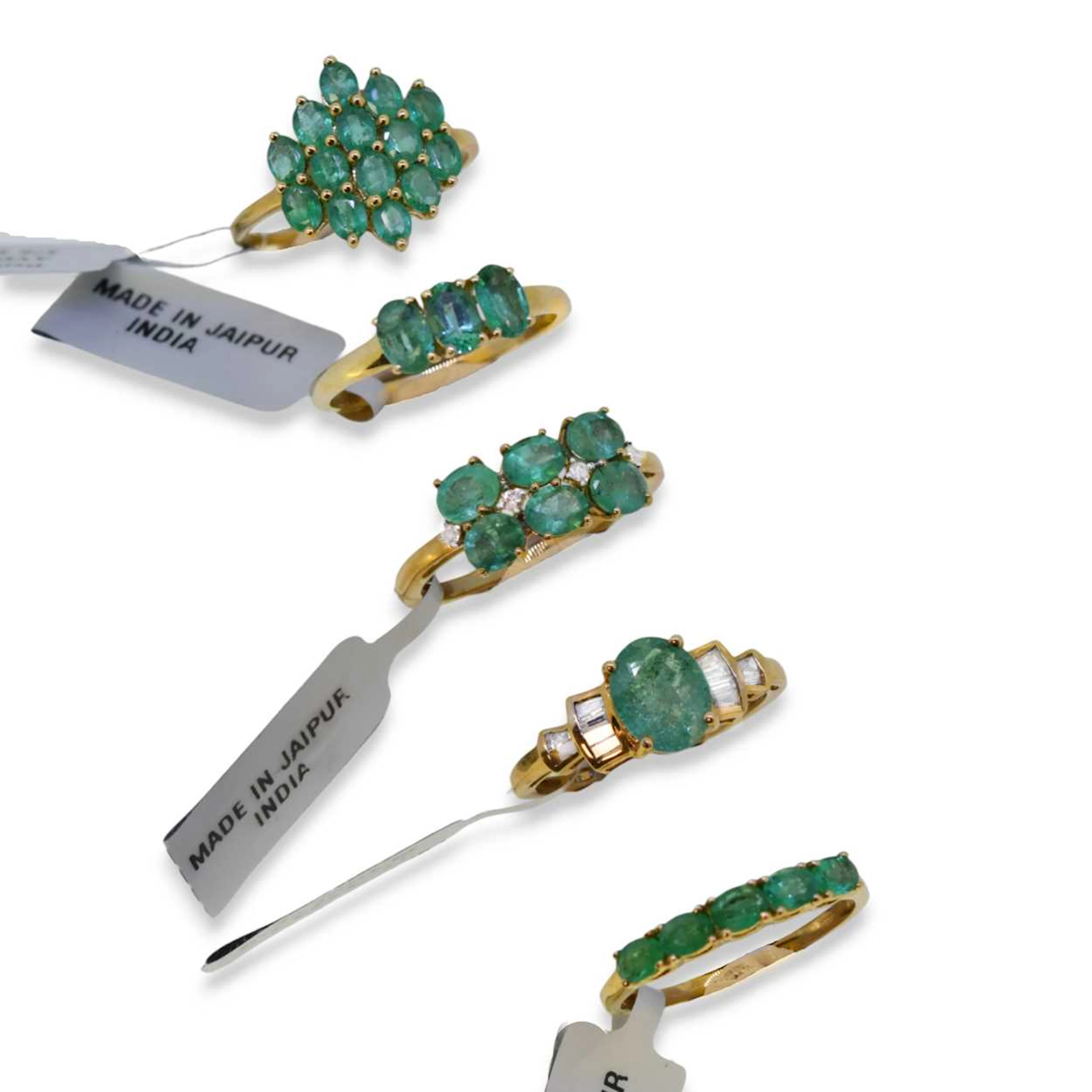 Five 9ct gold emerald Gemporia rings