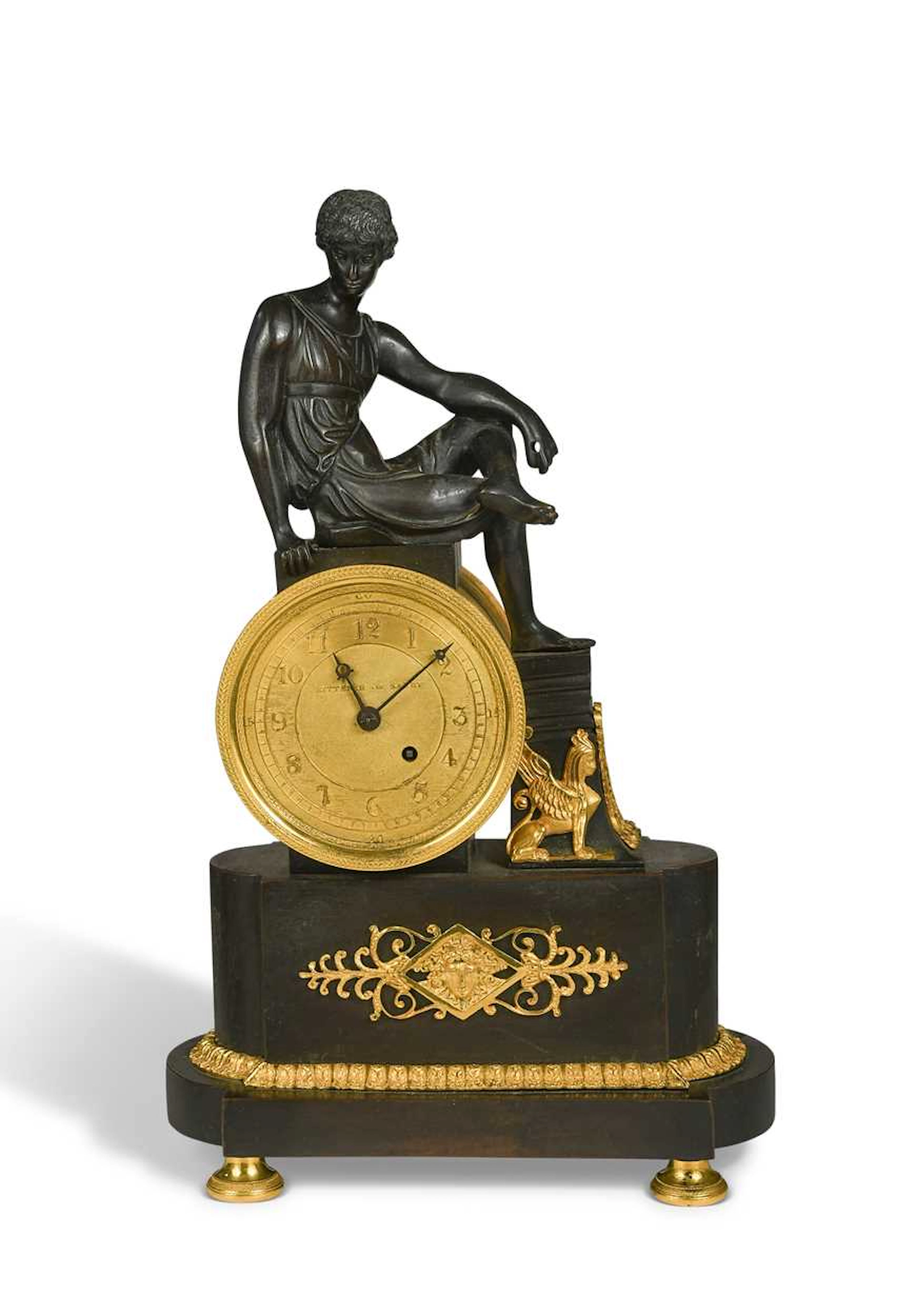 An Empire style bronze and ormolu mantel timepiece circa 1870