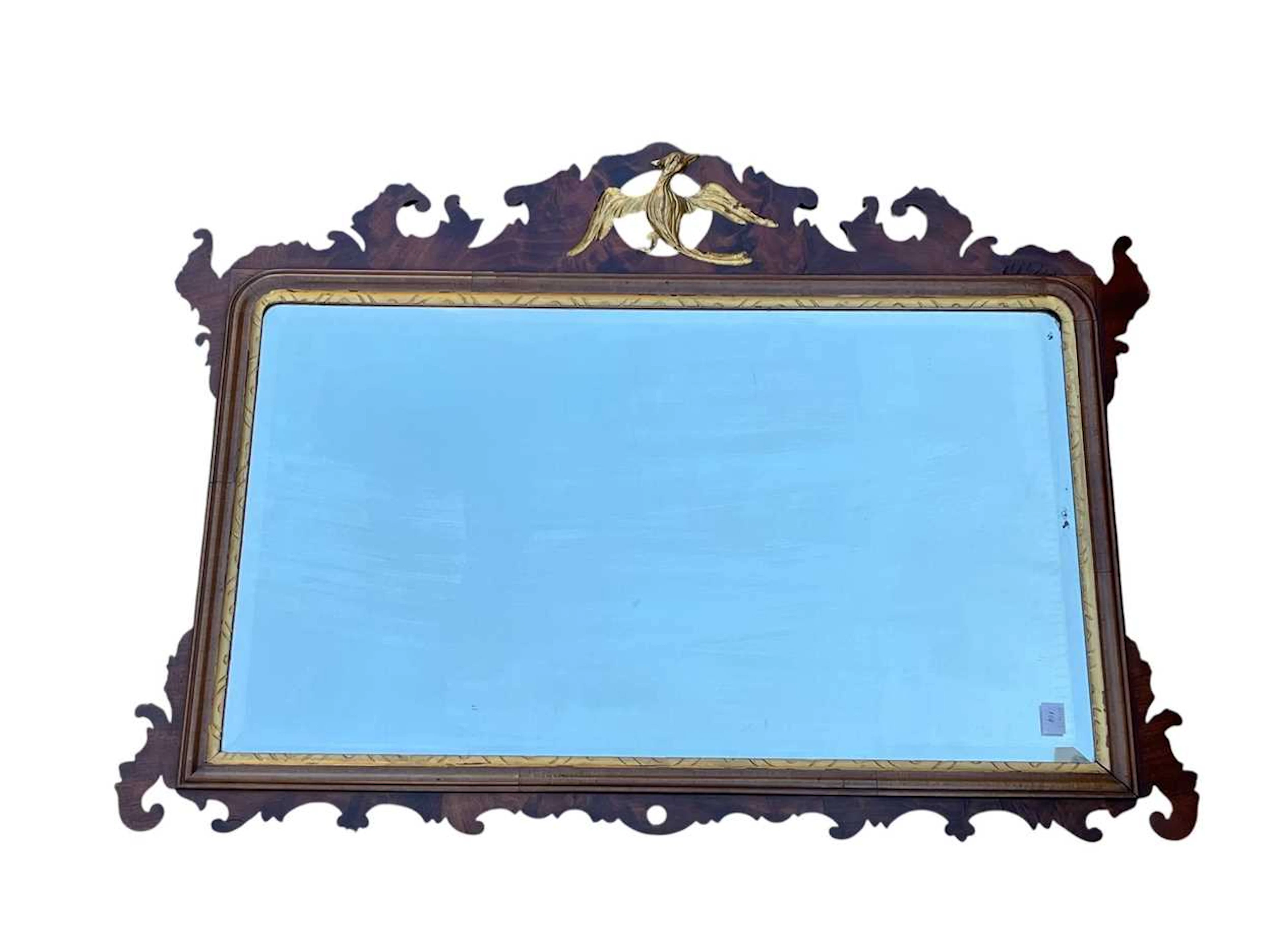 A George III style fret work wall mirror