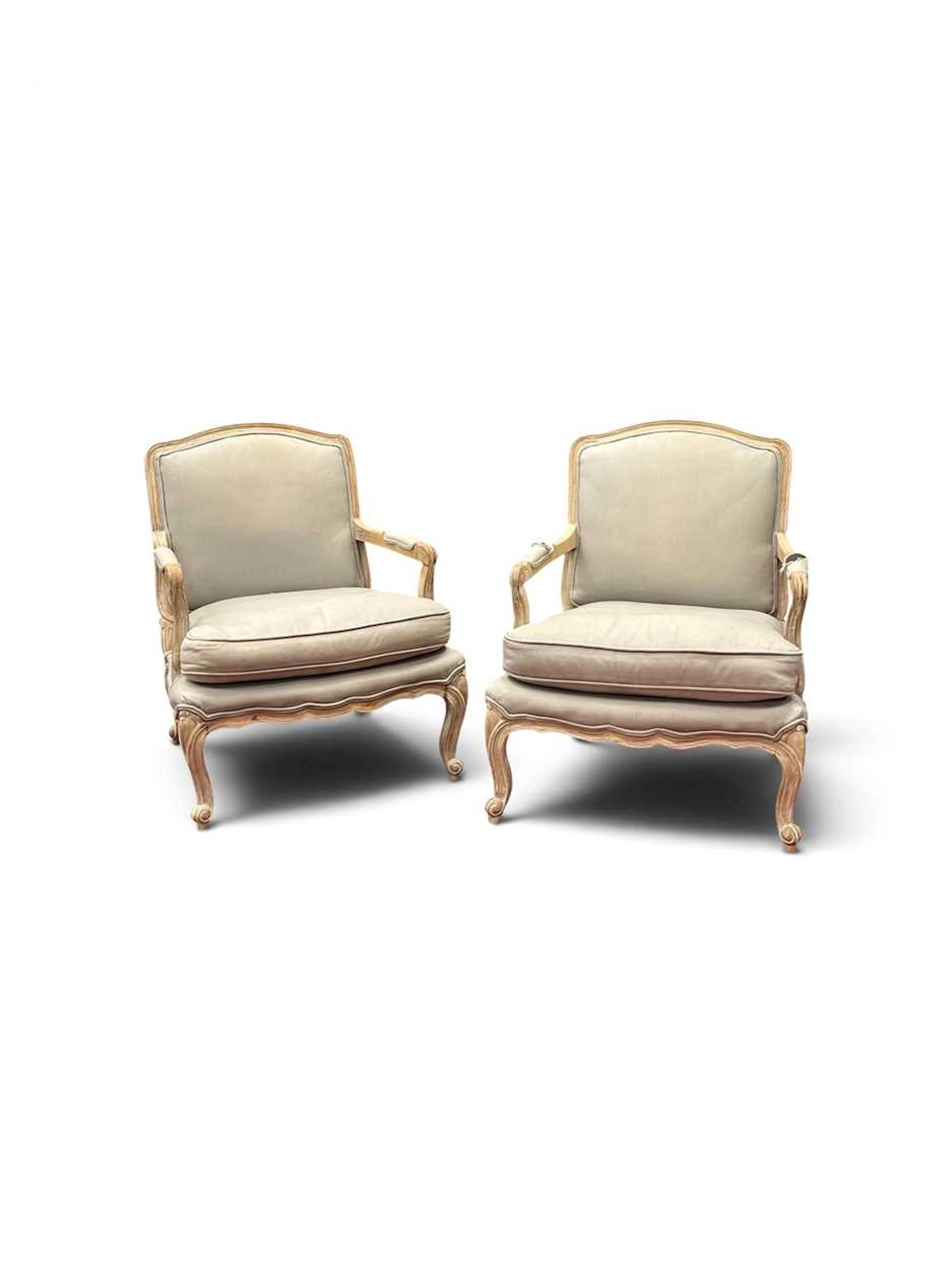 A pair of French Louis XV style fauteuils or open armchairs
