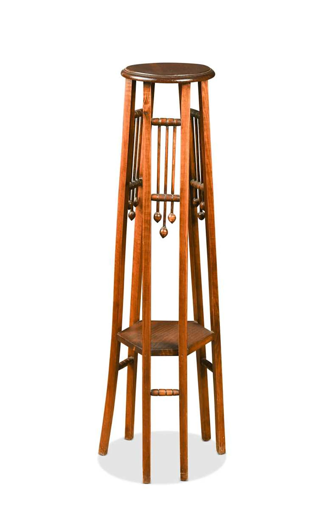 A Vienna style stained beech jardiniere stand