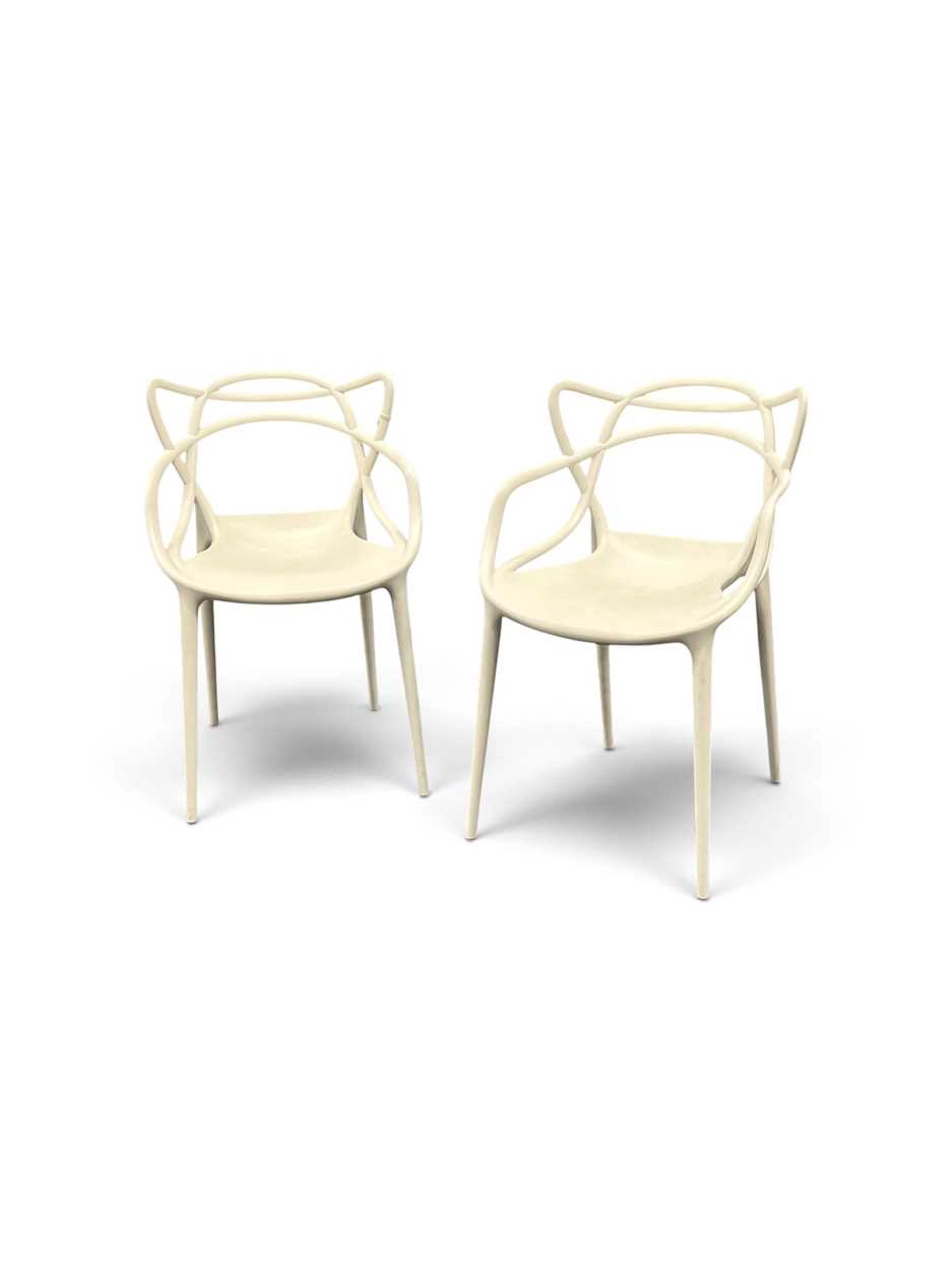 Two Phillipe Stark Masters chairs for Kartell