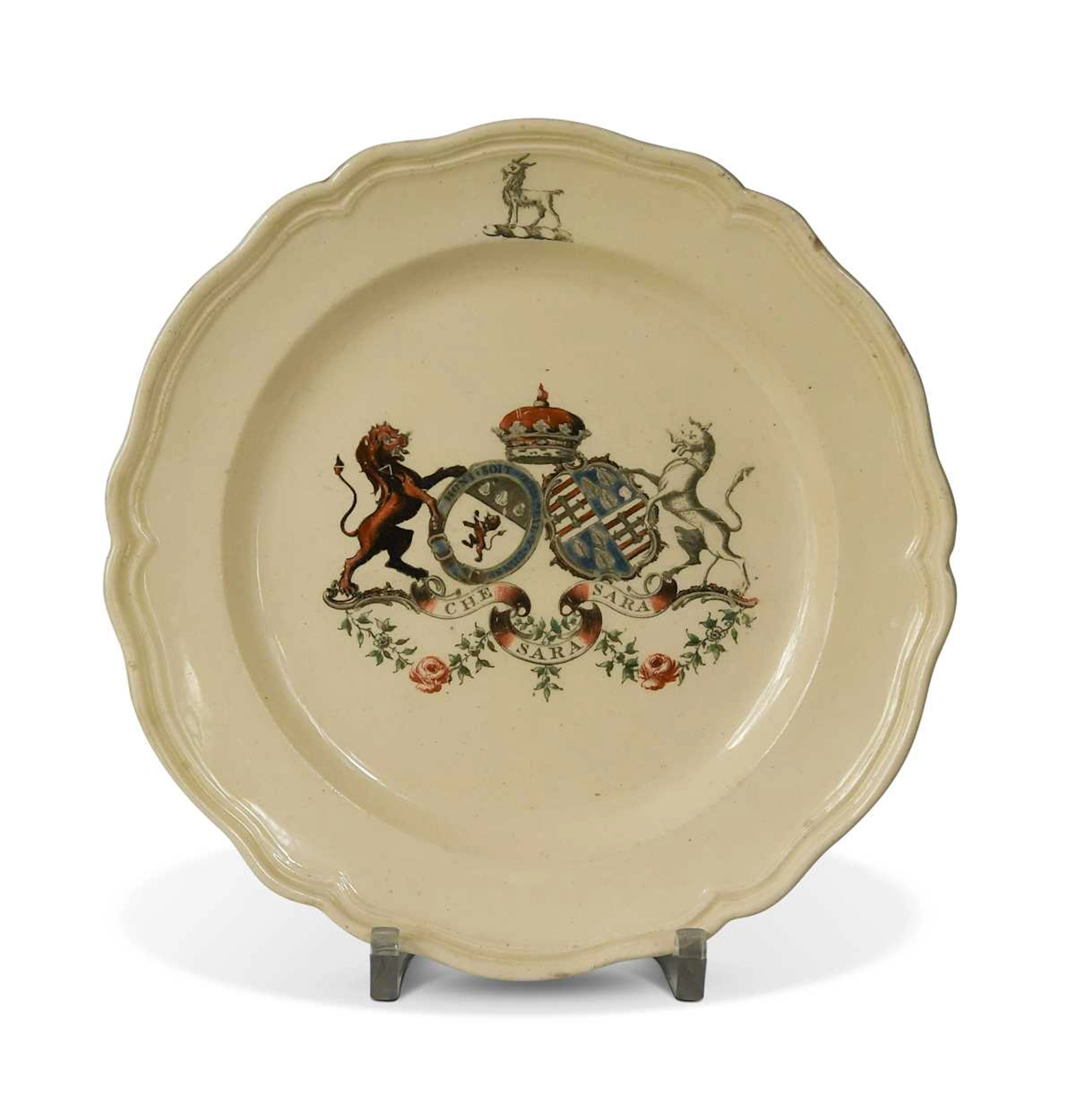 A rare creamware armorial plate, 18th century