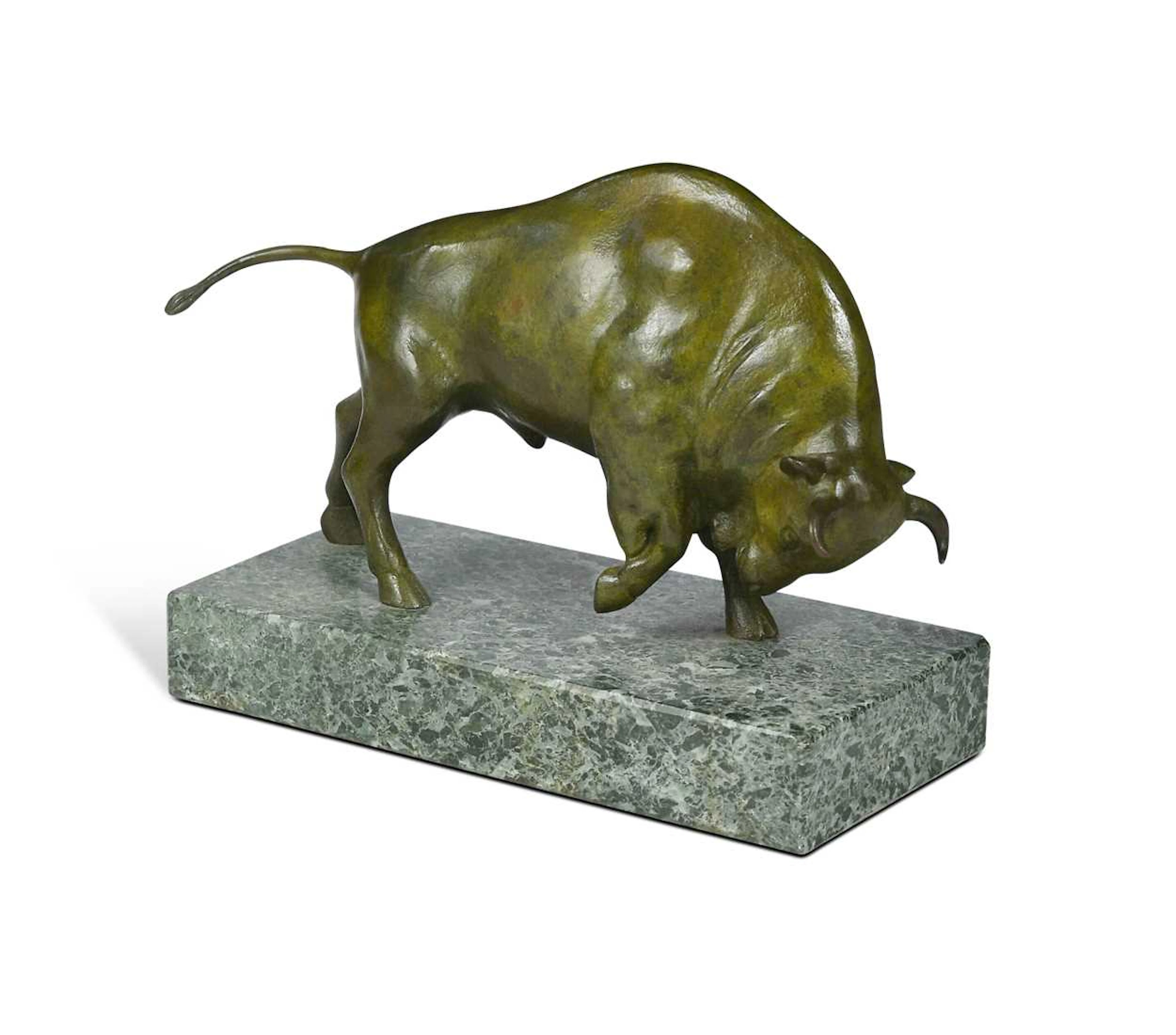 A patinated bronze Art Deco model of a charging bull, 20th century