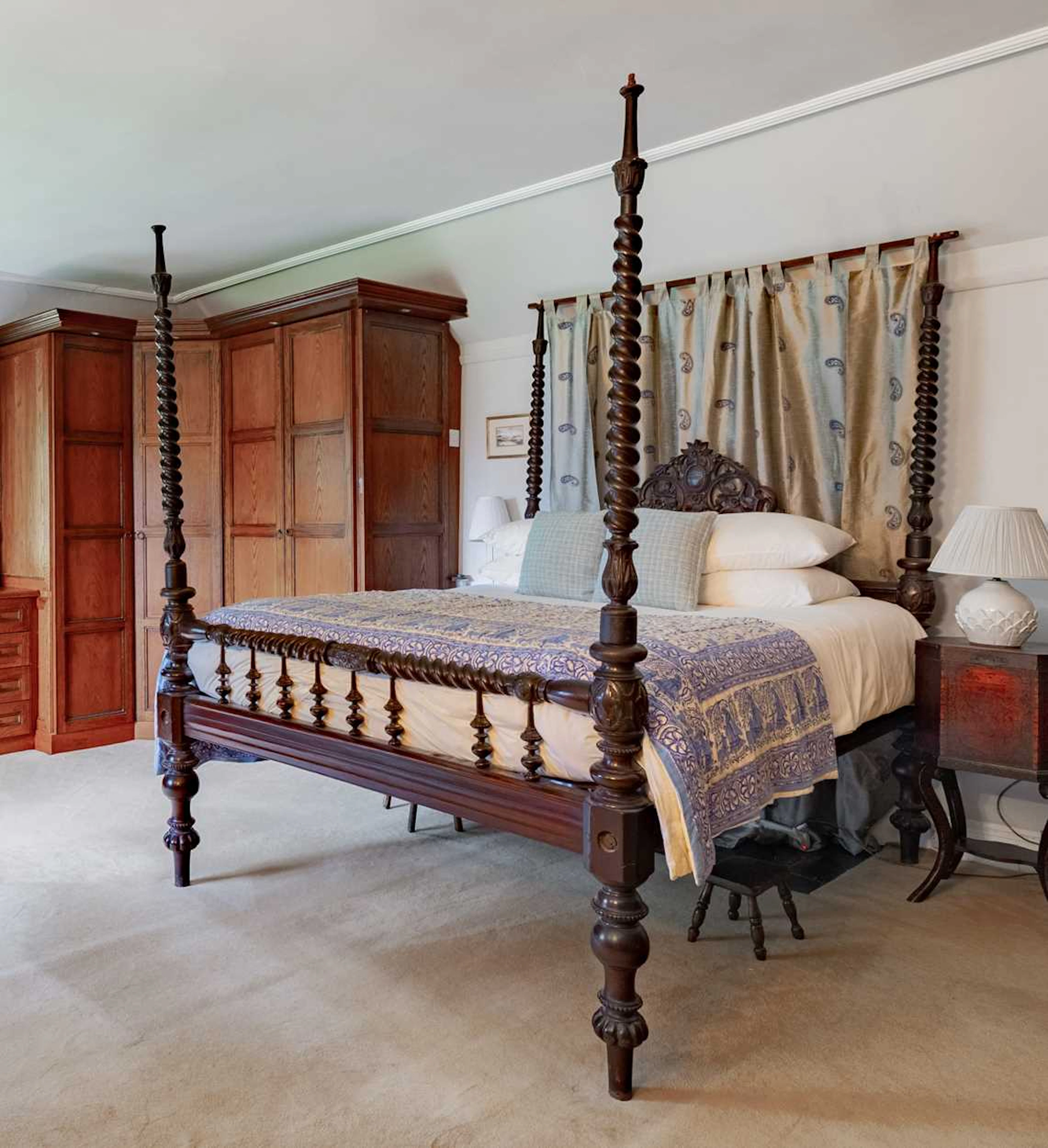 An Anglo Indian carved wood bed