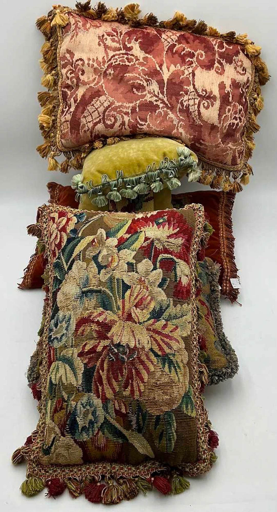 A petitpoint tapestry fragment of parrot tulips and daffodils