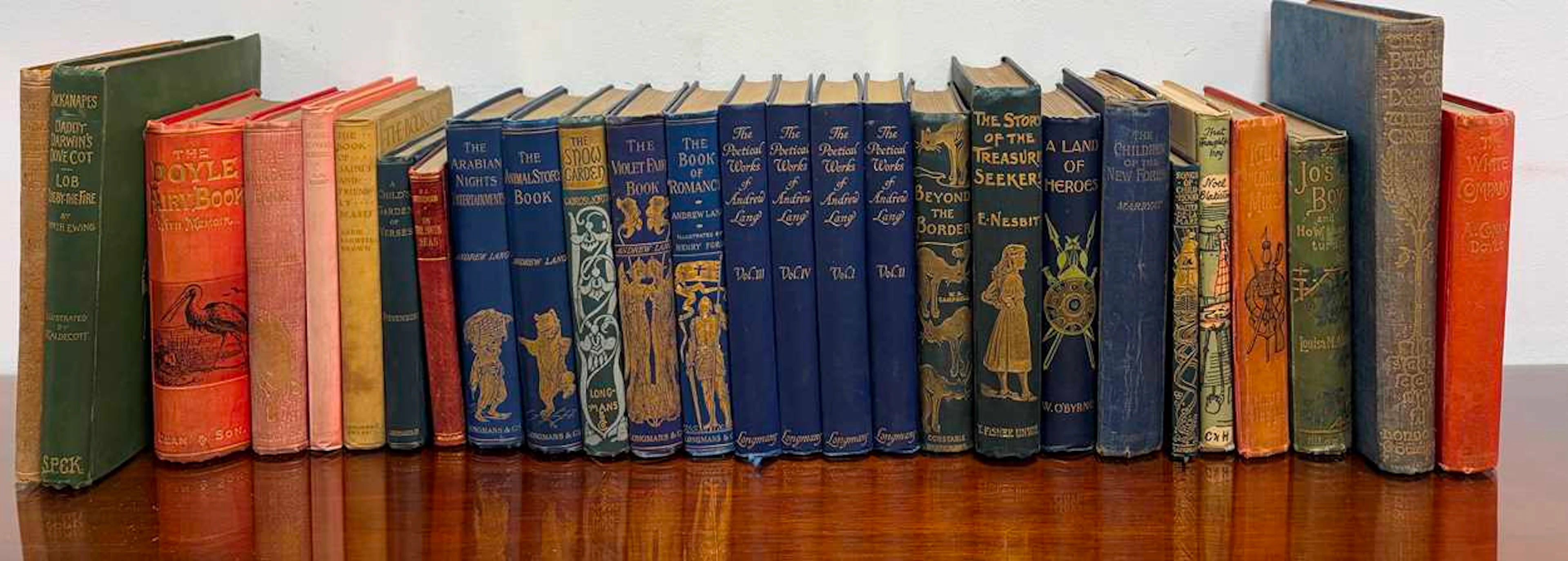 Children's literature including Andrew LANG works in cloth gilt bindings.