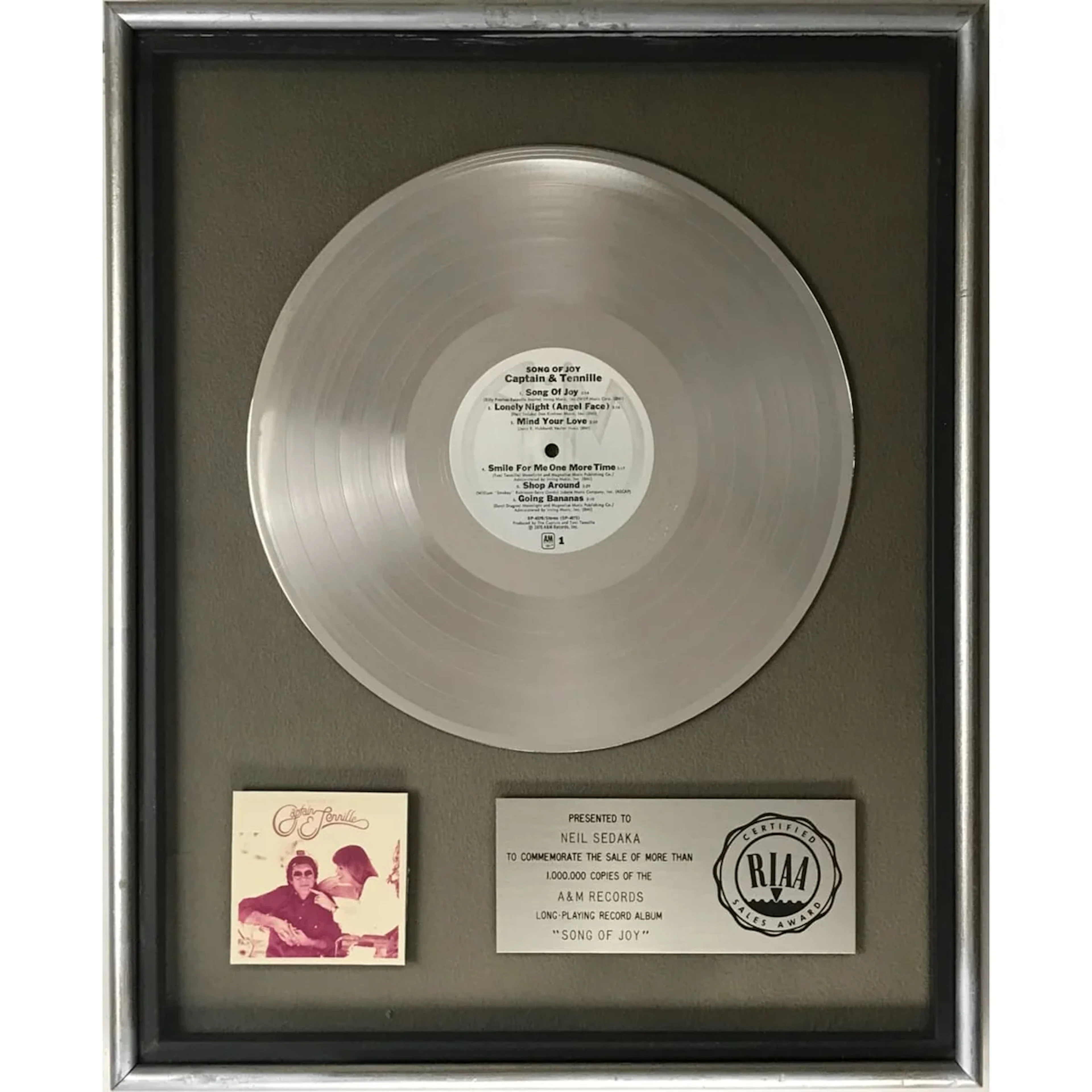 Captain & Tennille Song Of Joy RIAA Platinum LP Award presented to