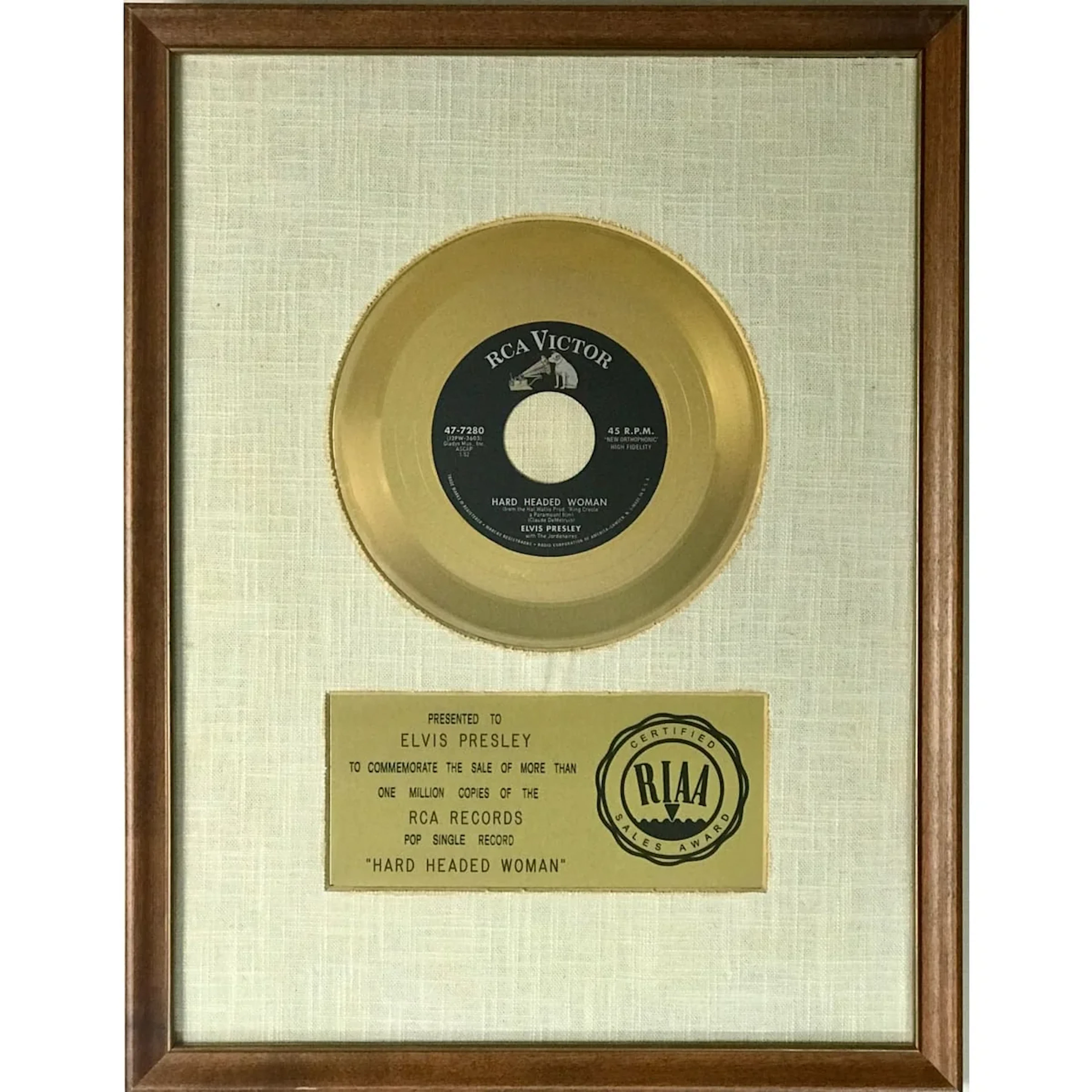 Elvis Presley "Hard Headed Woman" RIAA Gold 45 Award presented to
