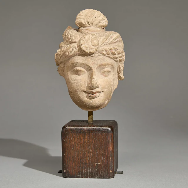 Ancient Gandharan Stucco Head of Buddha Attendant