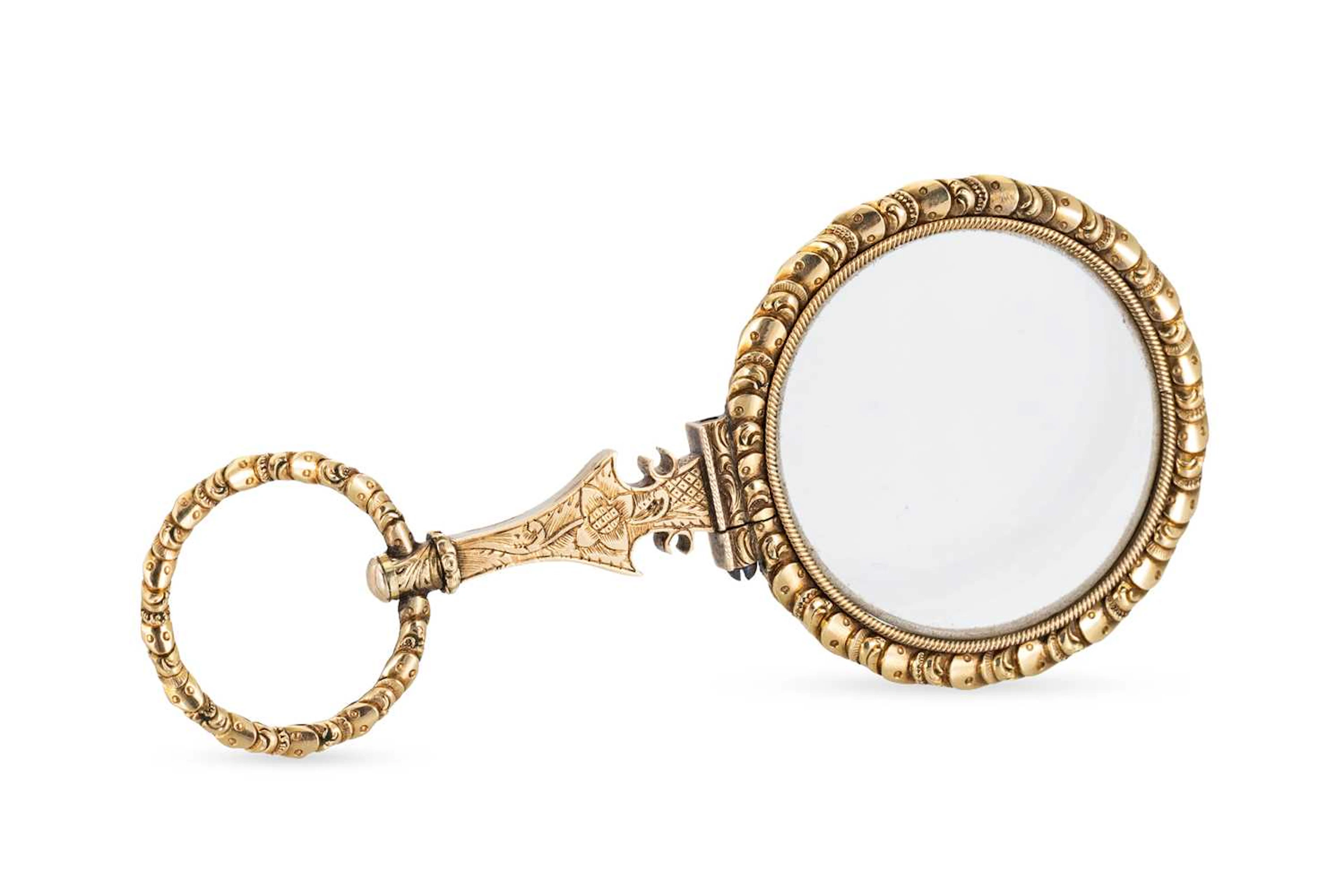AN ANTIQUE QUIZZING GLASS