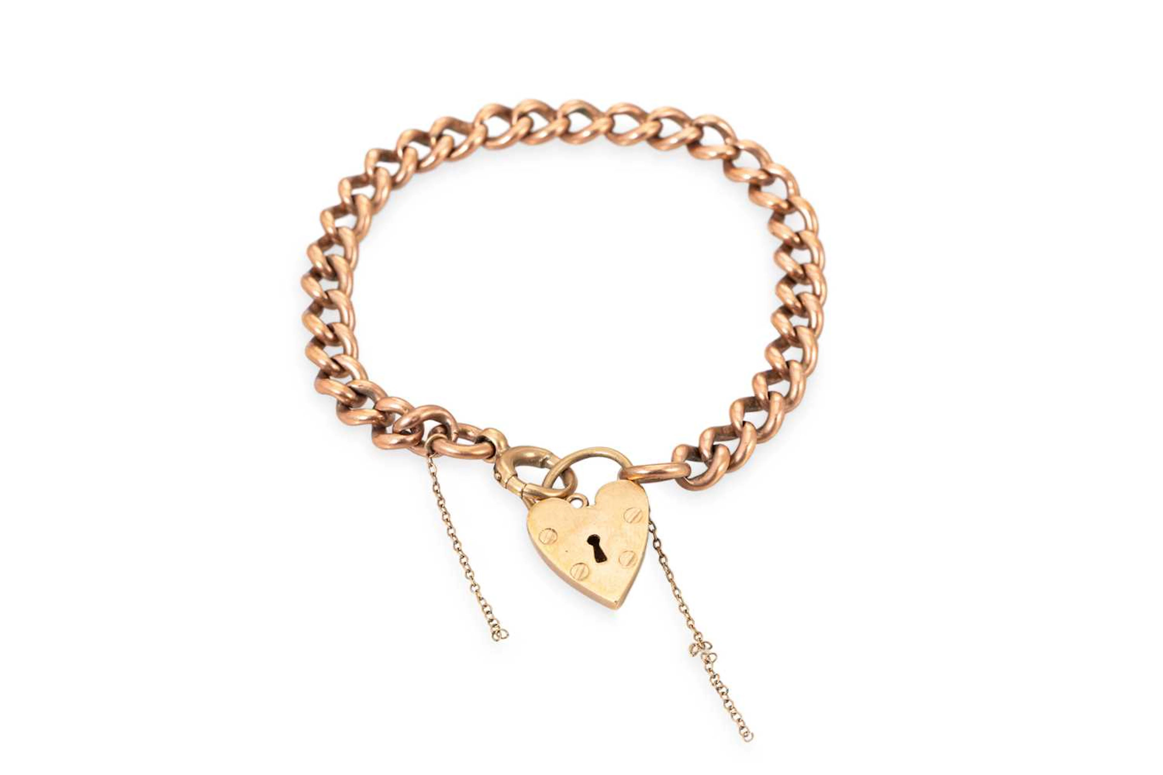 A VINTAGE 9CT GOLD CURB LINK BRACELET
