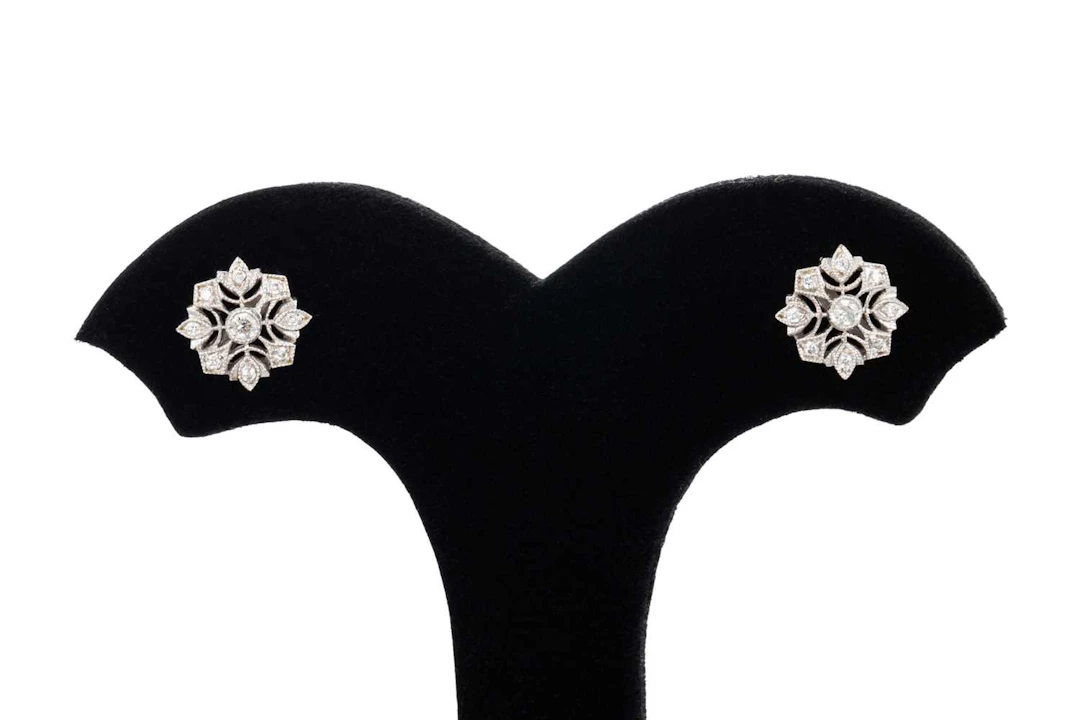 A PAIR OF DIAMOND SET CLUSTER EARRINGS