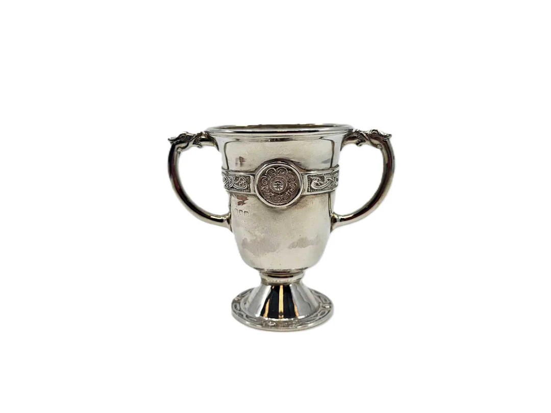 A 1920s TWO HANDLED STERLING SILVER CUP