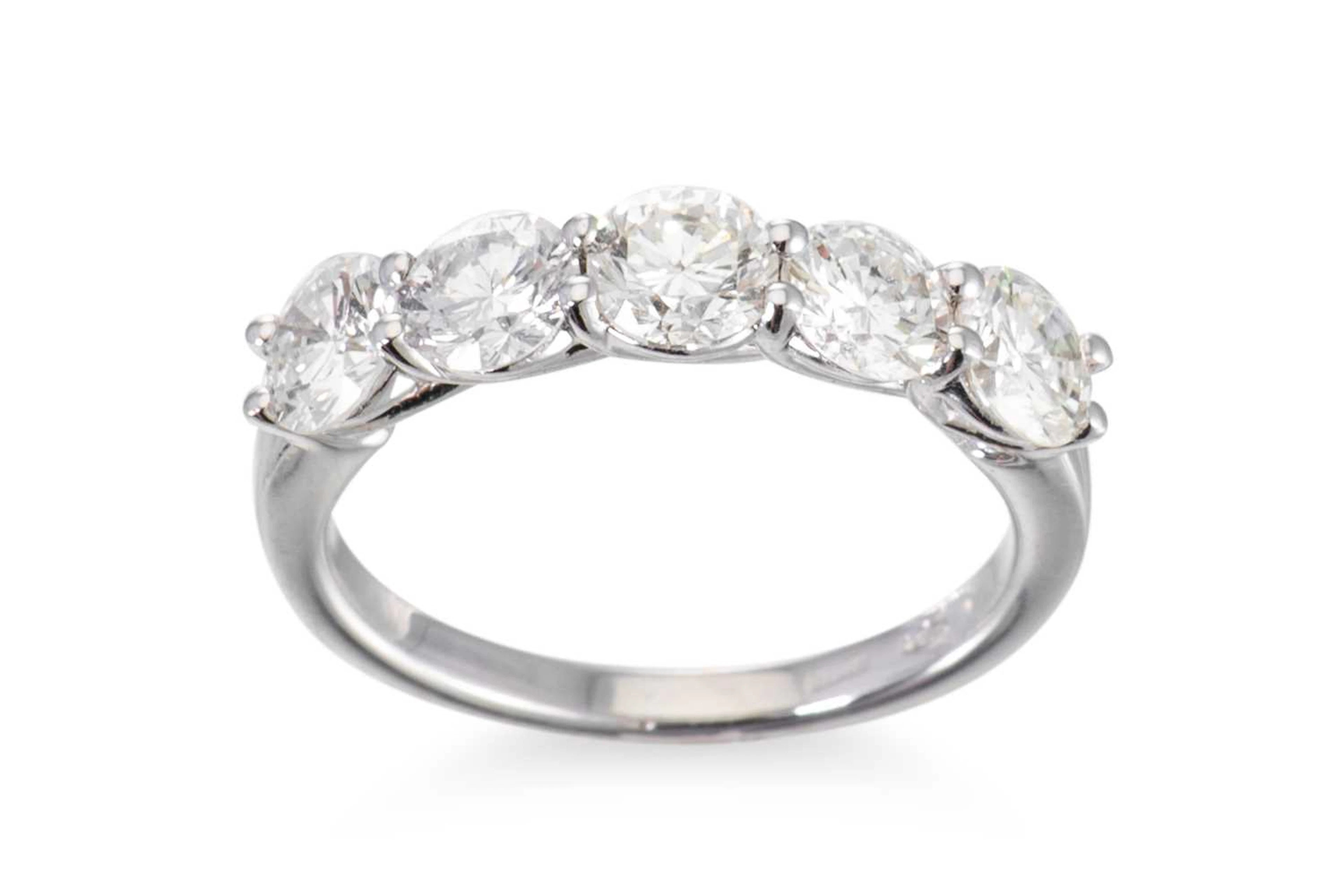 A DIAMOND FIVE STONE RING