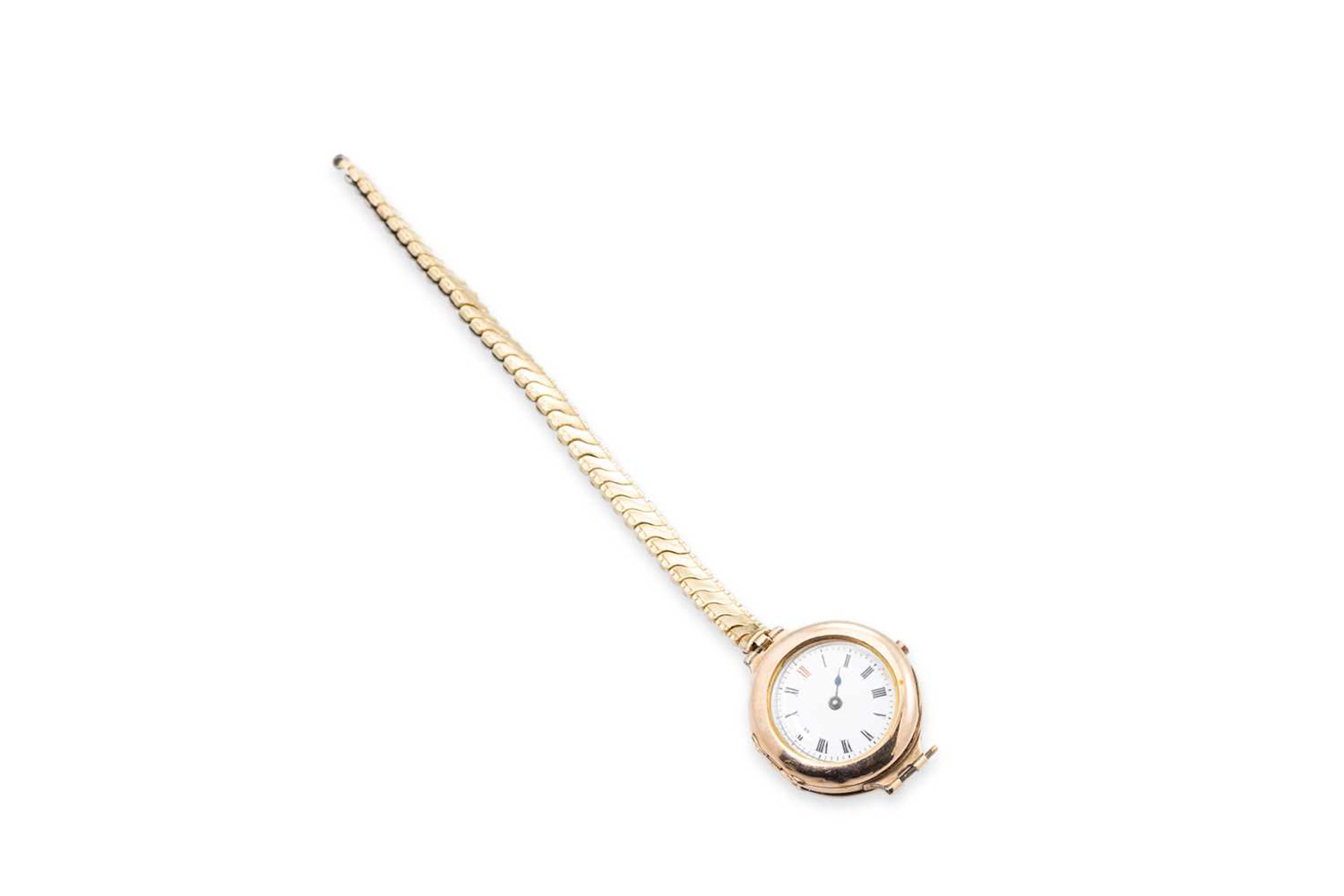 AN ANTIQUE GOLD CASED WATCH