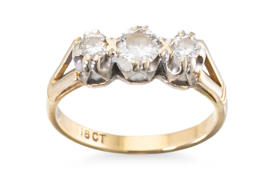 A THREE STONE DIAMOND RING
