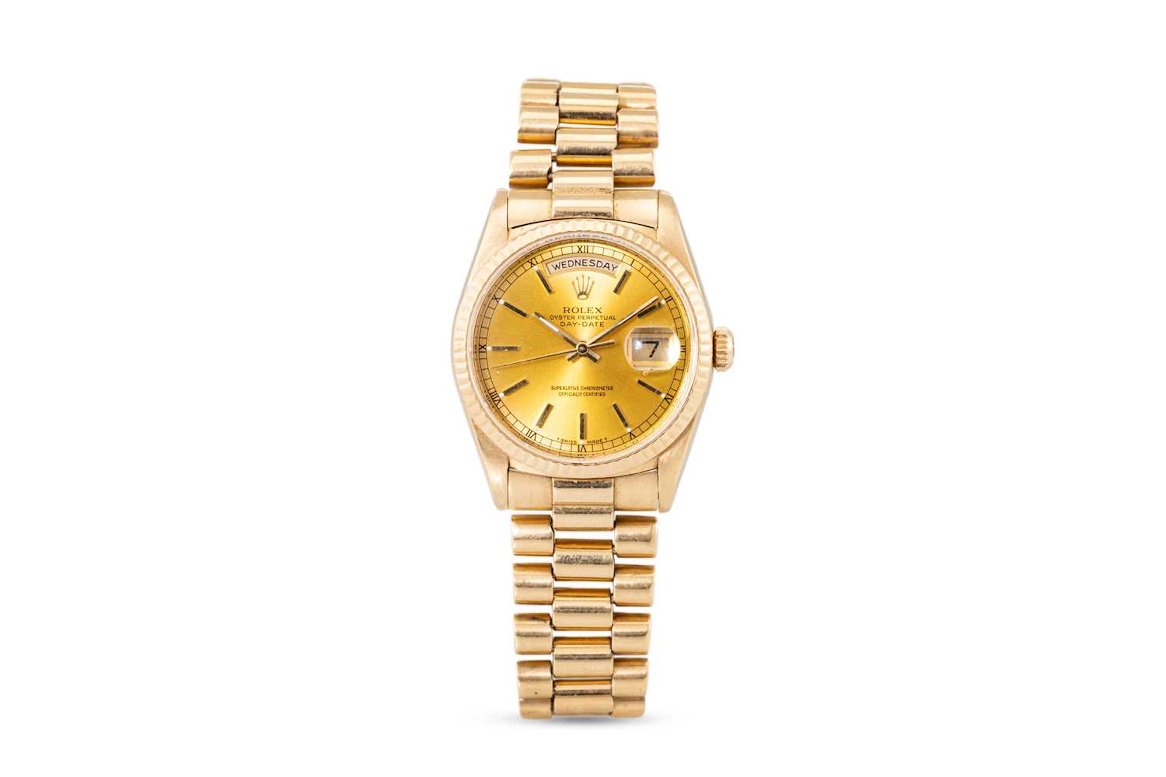 AN 18CT GOLD ROLEX OYSTER PERPETUAL DAY/DATE WRIST WATCH