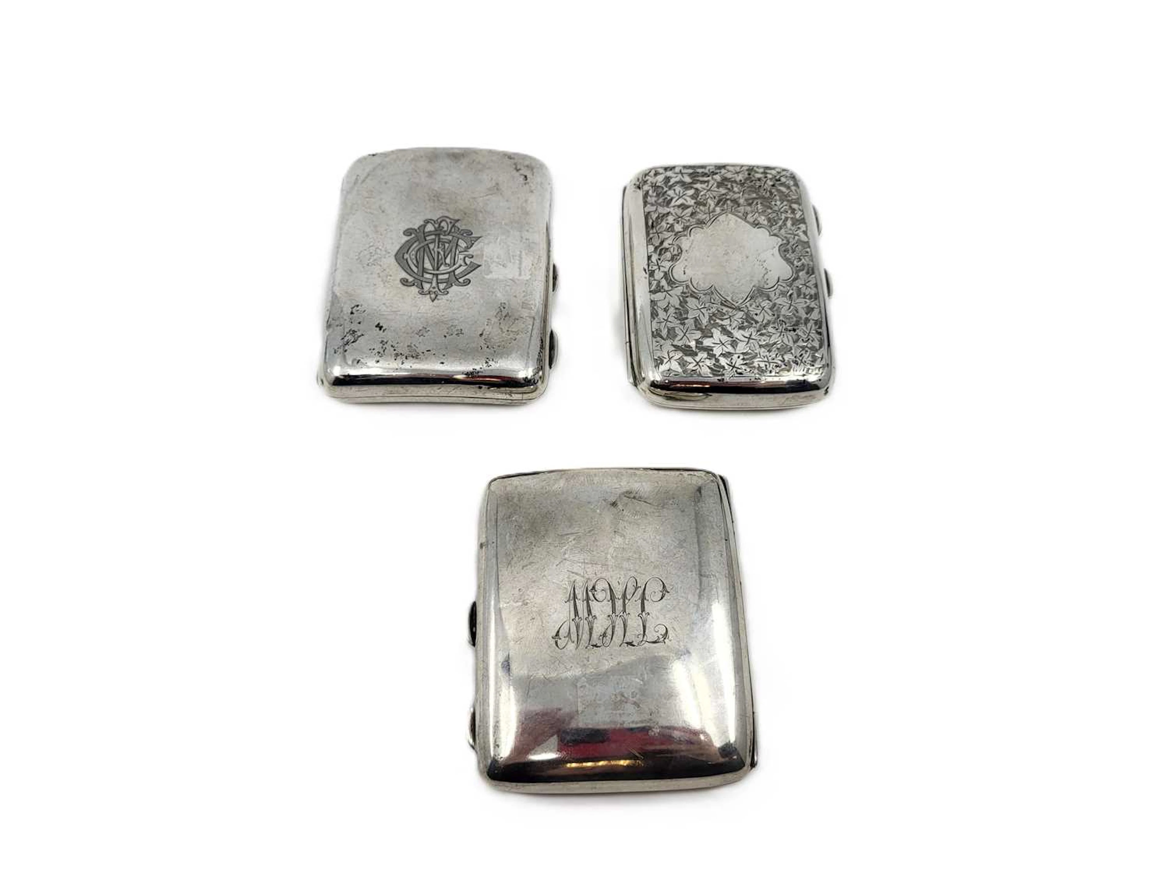 THREE ANTIQUE / VINTAGE SILVER CIGARETTE CASES
