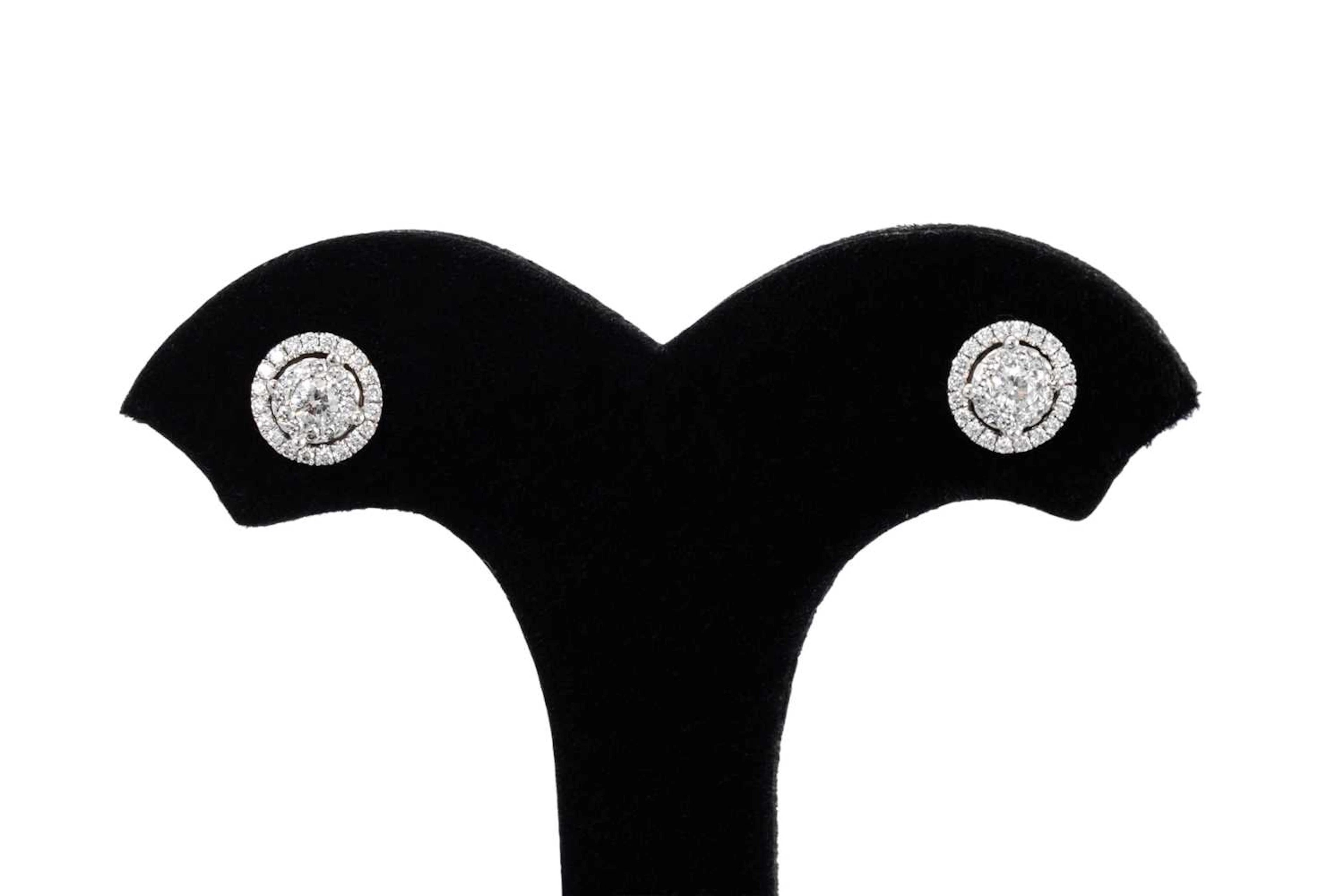 A PAIR OF DIAMOND CLUSTER STUD EARRINGS