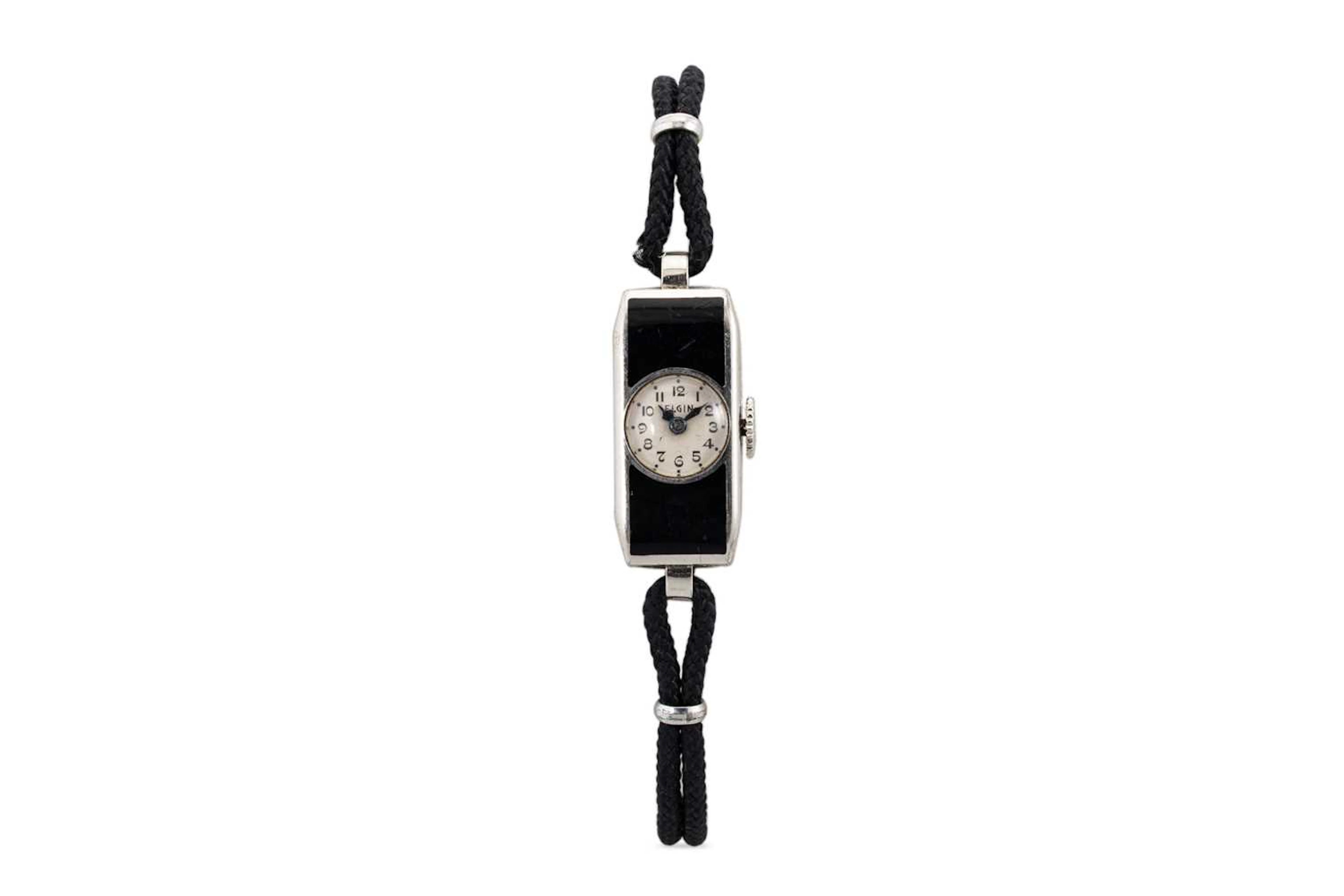 A BLACK ENAMEL ART DECO DRESS WATCH