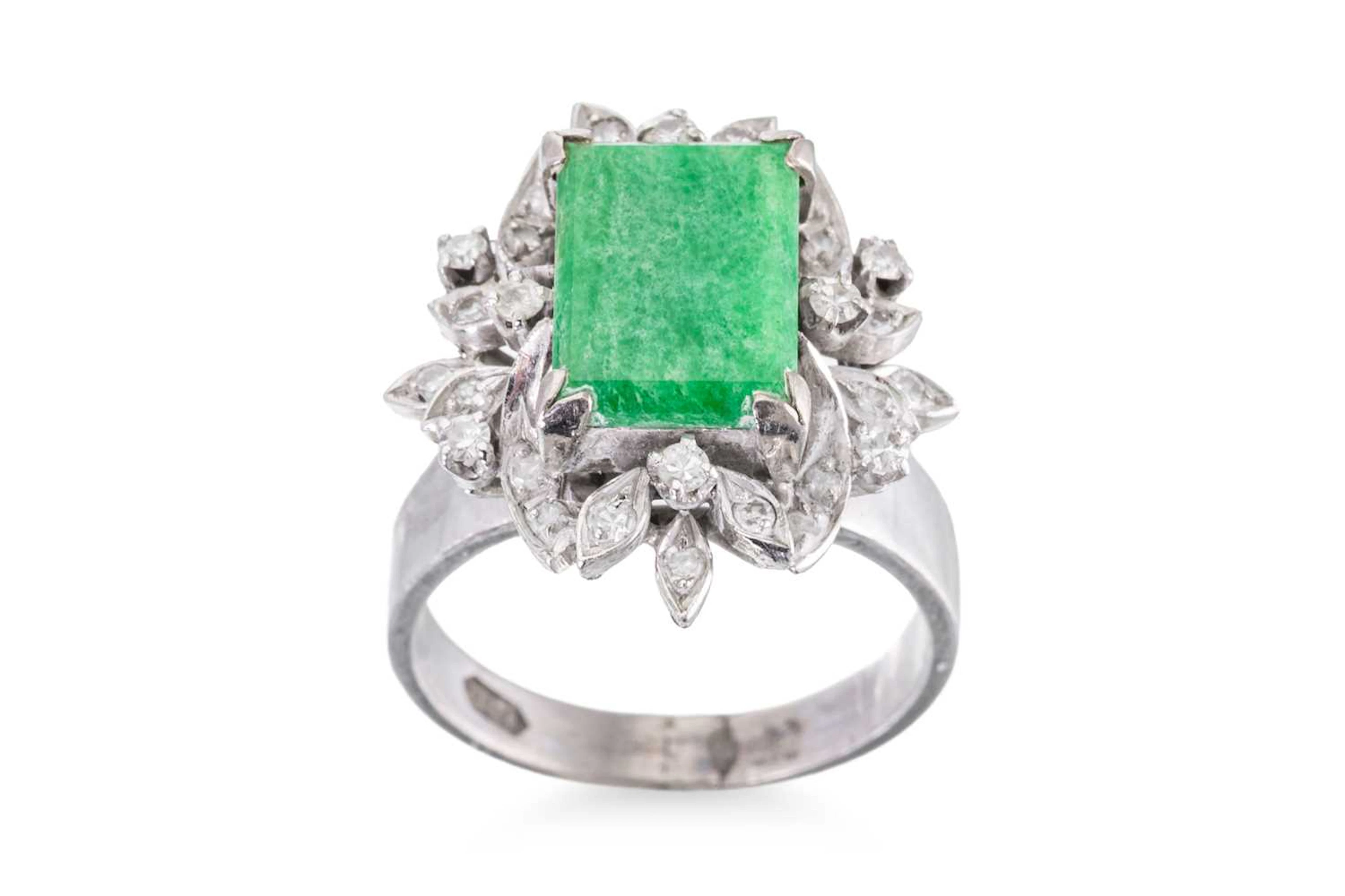 A DIAMOND AND JADE CLUSTER RING