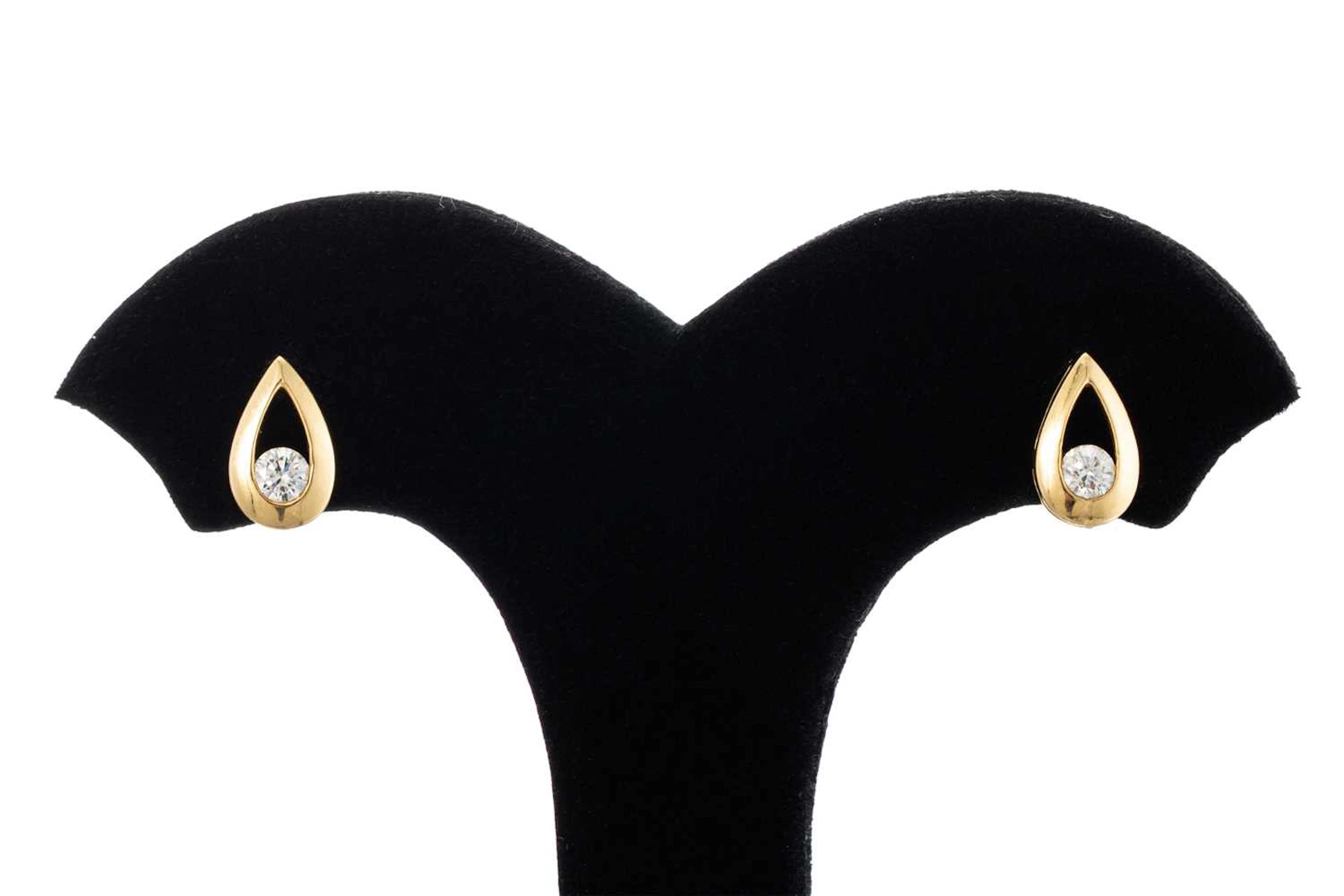 A PAIR OF DIAMOND EARRINGS