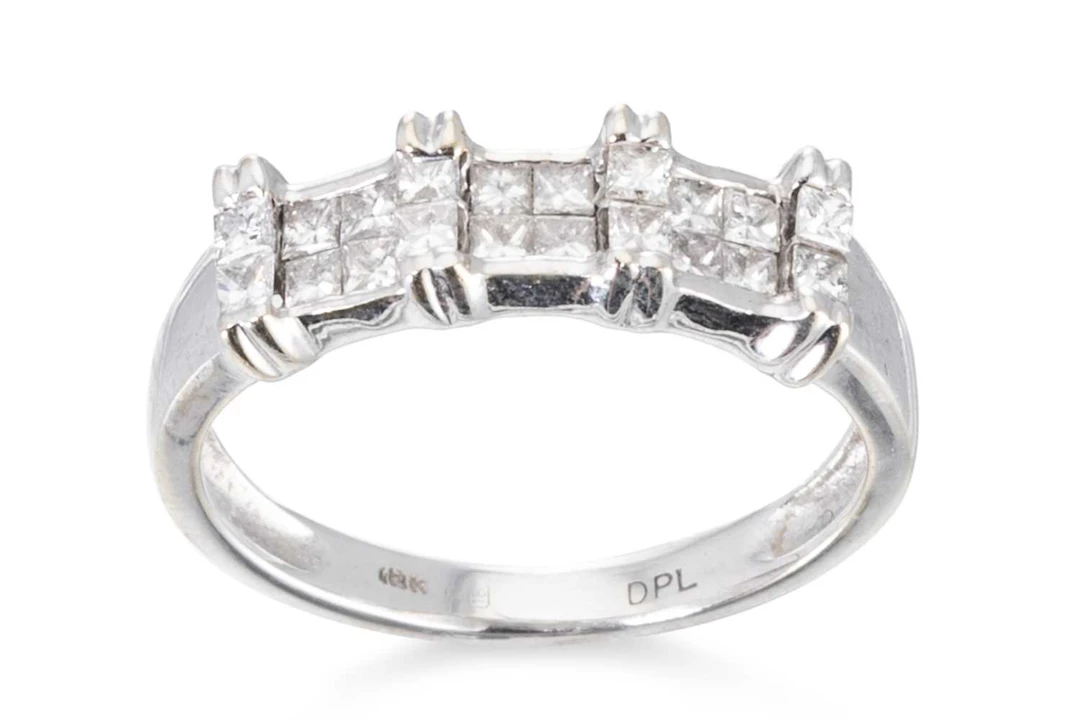 A DIAMOND SET BAND RING