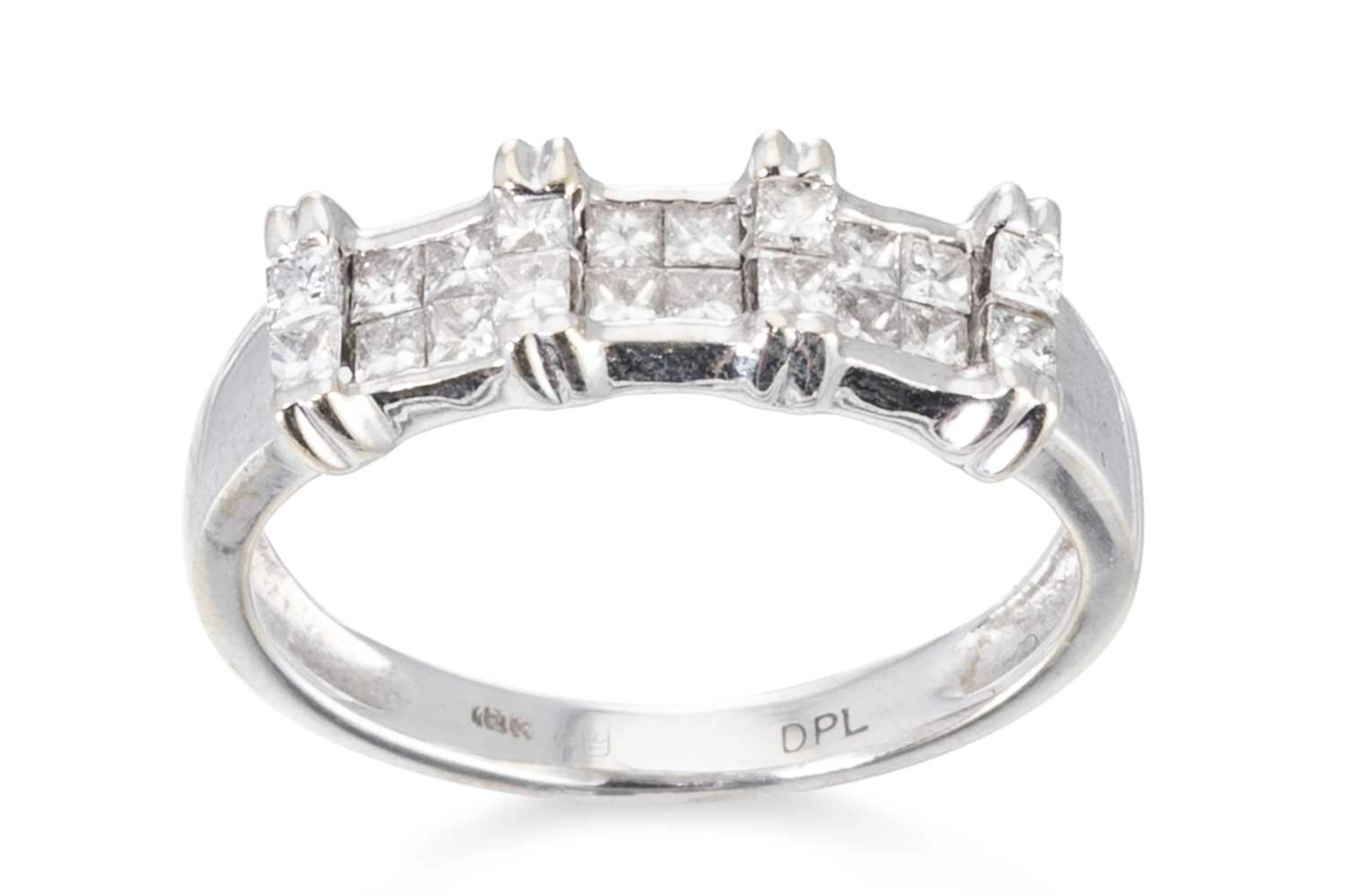 A DIAMOND SET BAND RING