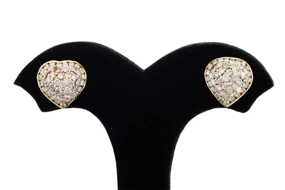 A PAIR OF PAVÉ SET DIAMOND EARRINGS