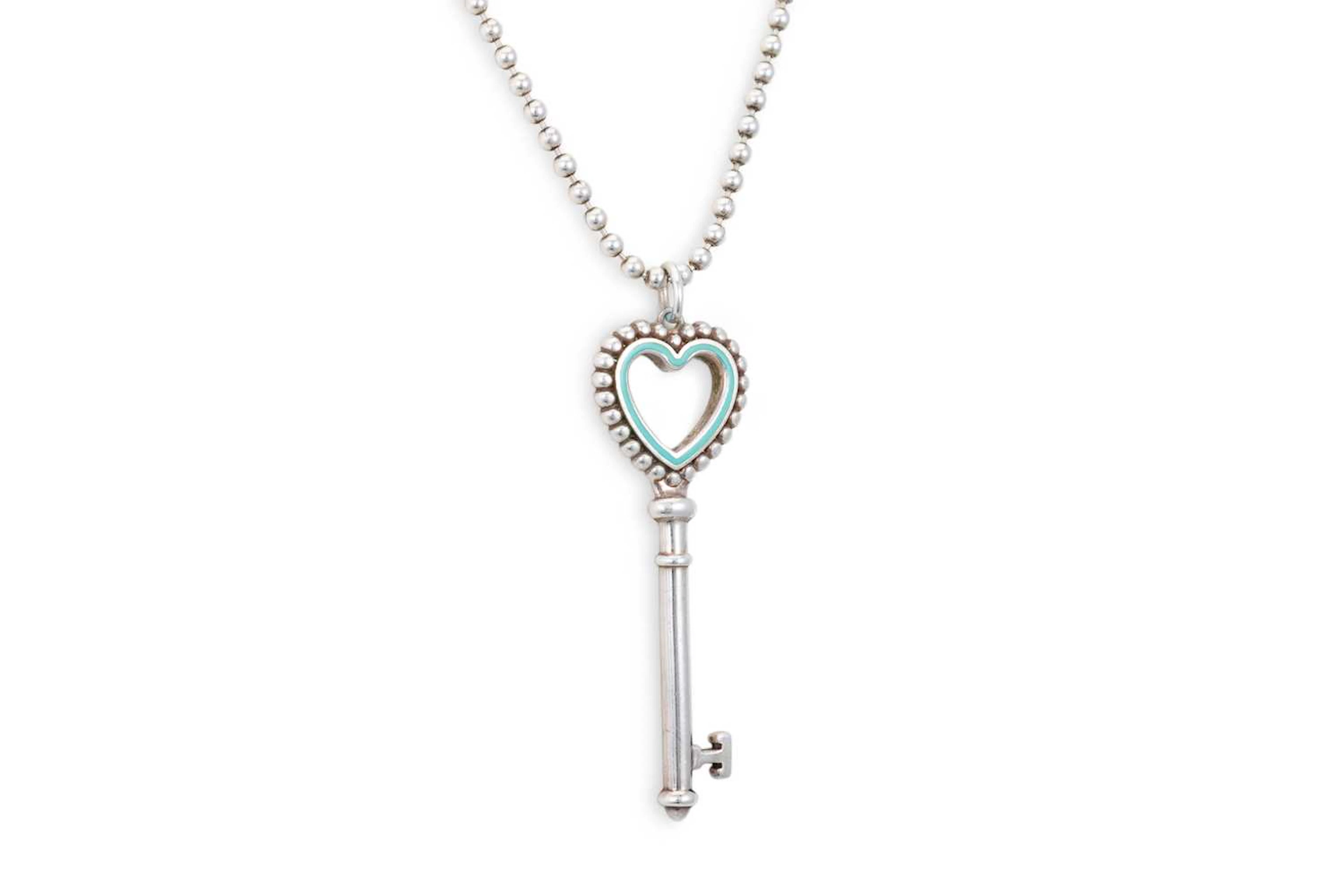 A SILVER TIFFANY PENDANT AND CHAIN