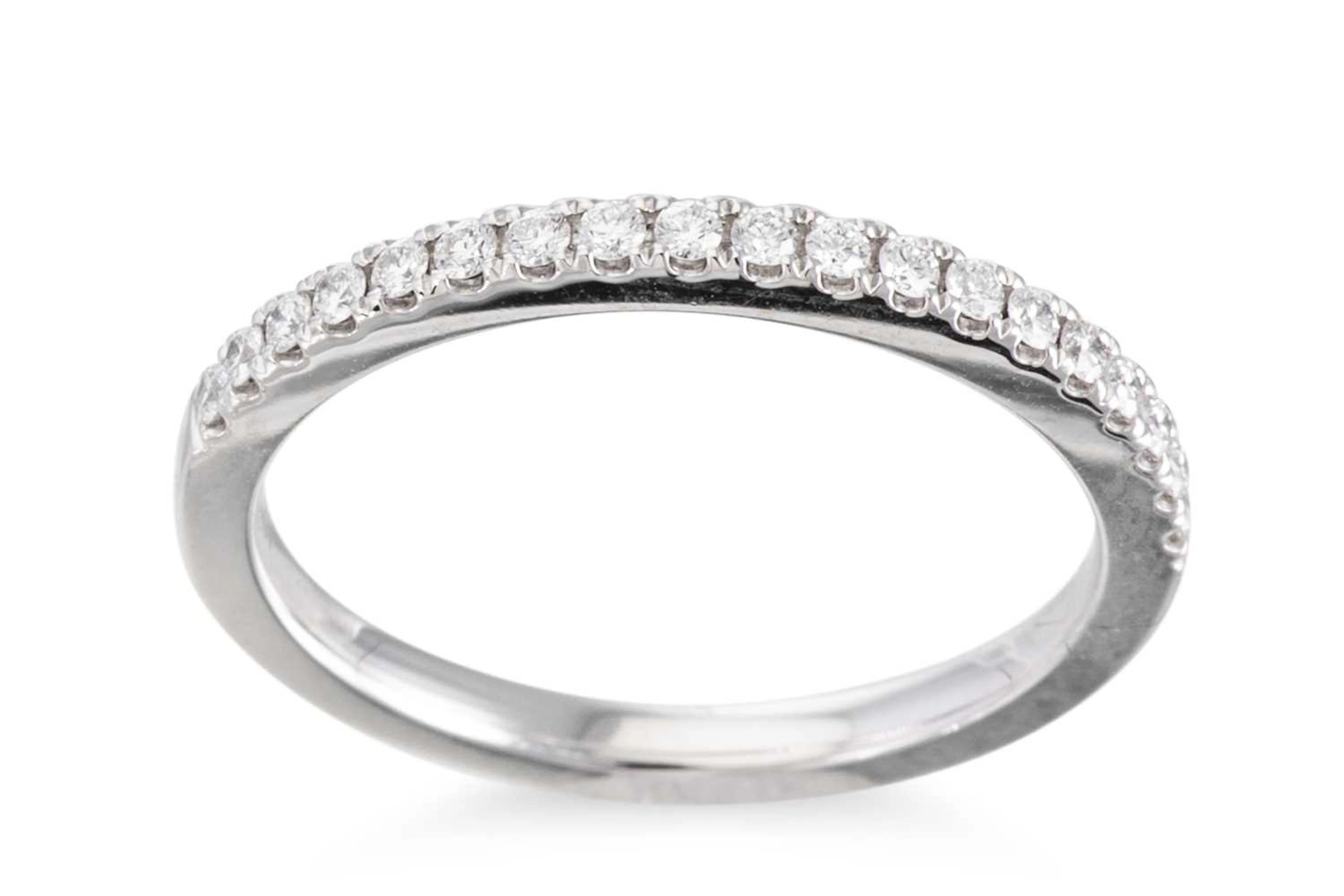 A DIAMOND HALF ETERNITY RING