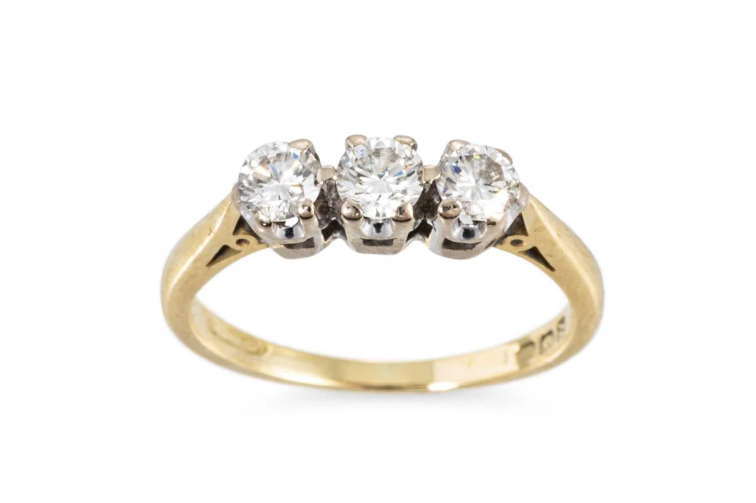 A THREE STONE DIAMOND RING