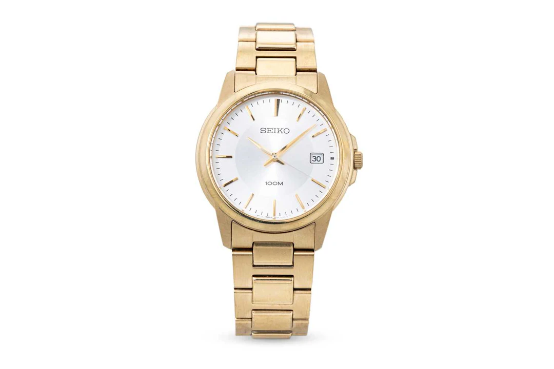A STAINLESS STEEL & GILT SEIKO WRIST WATCH