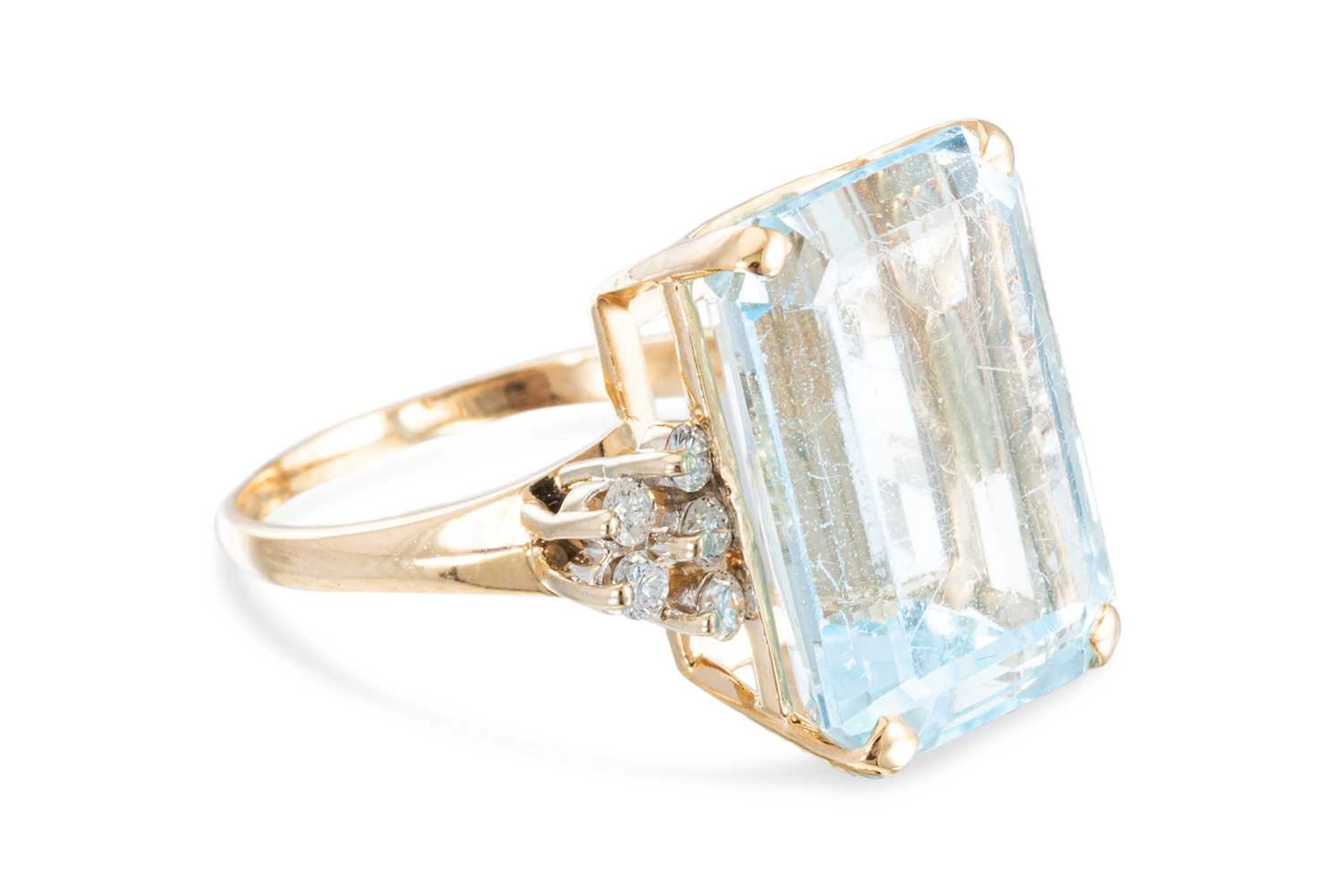 A TOPAZ AND DIAMOND RING