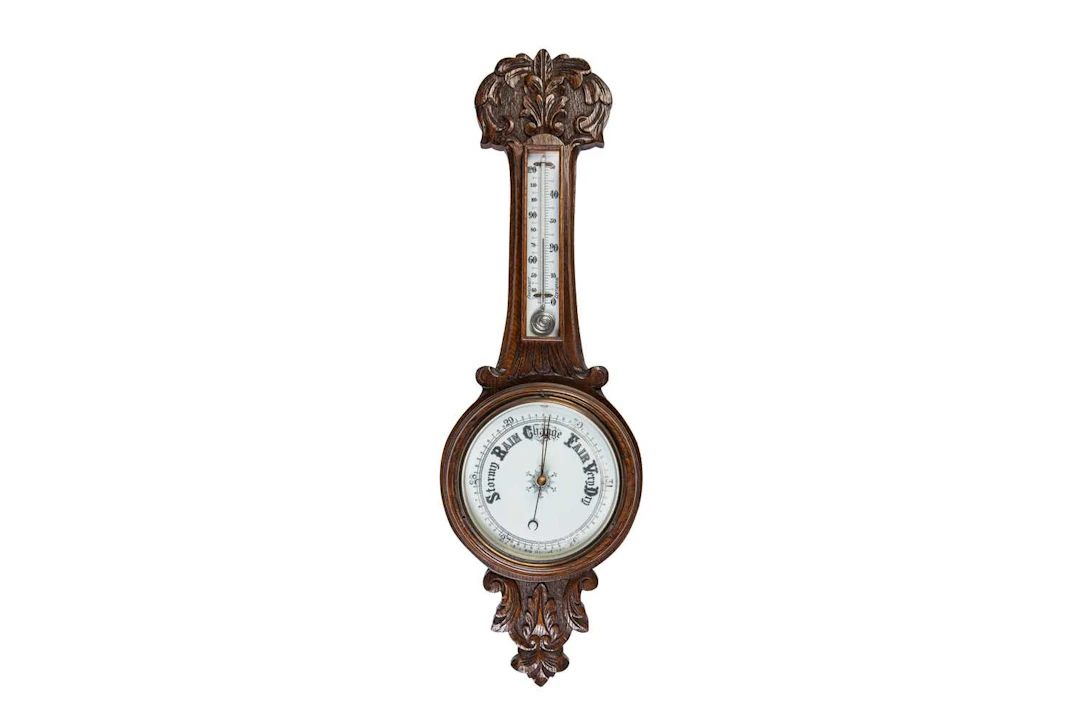 AN EDWARDIAN ANEROID BAROMETER