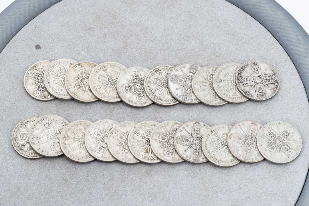 A QUANTITY OF TWENTY-ONE ENGLISH SILVER CONTENT COINS