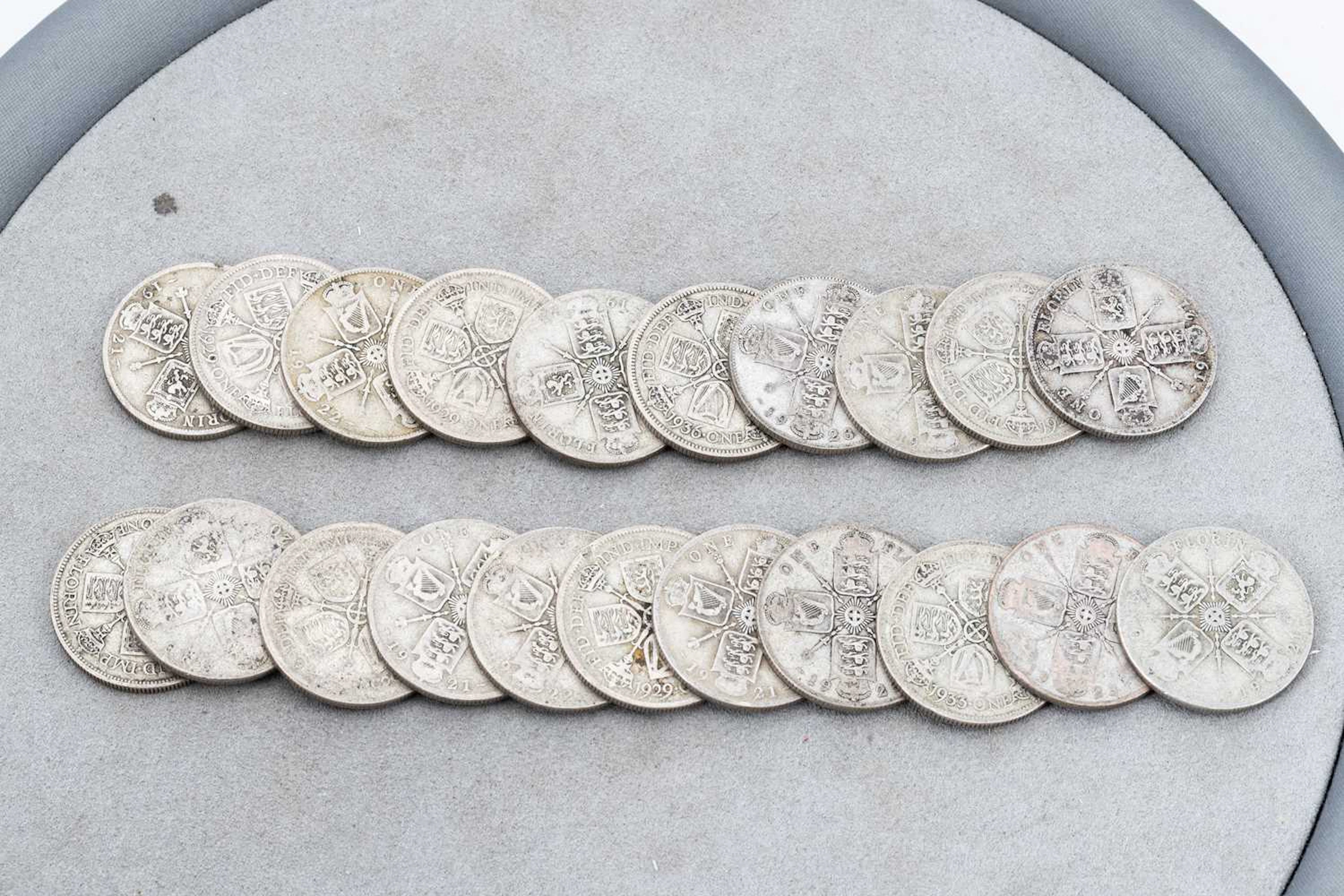 A QUANTITY OF TWENTY-ONE ENGLISH SILVER CONTENT COINS