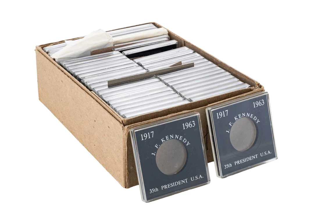 A BOX OF 45 NEW 1917-1963 KENNEDYS ½ DISPLAY BOXES