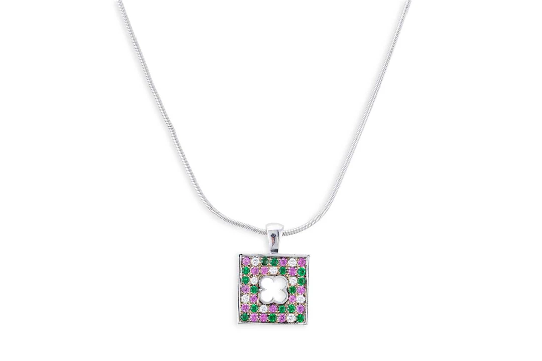 A MAUBOUSSIN DIAMOND AND GEMSET PENDANT