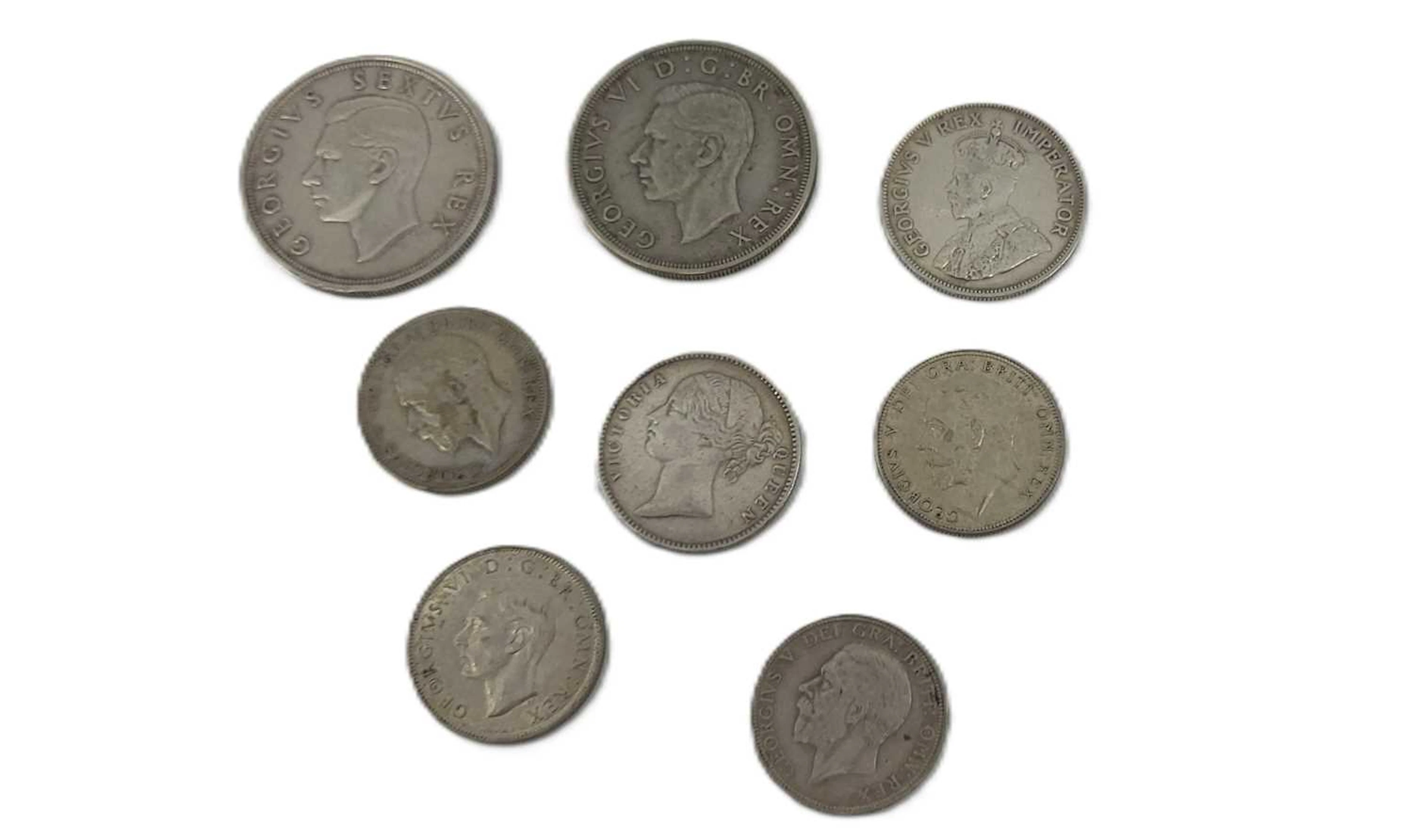 A COLLECTION OF 8 X 50% SOUTH AFRICAN & ENGLISH SILVER COINS