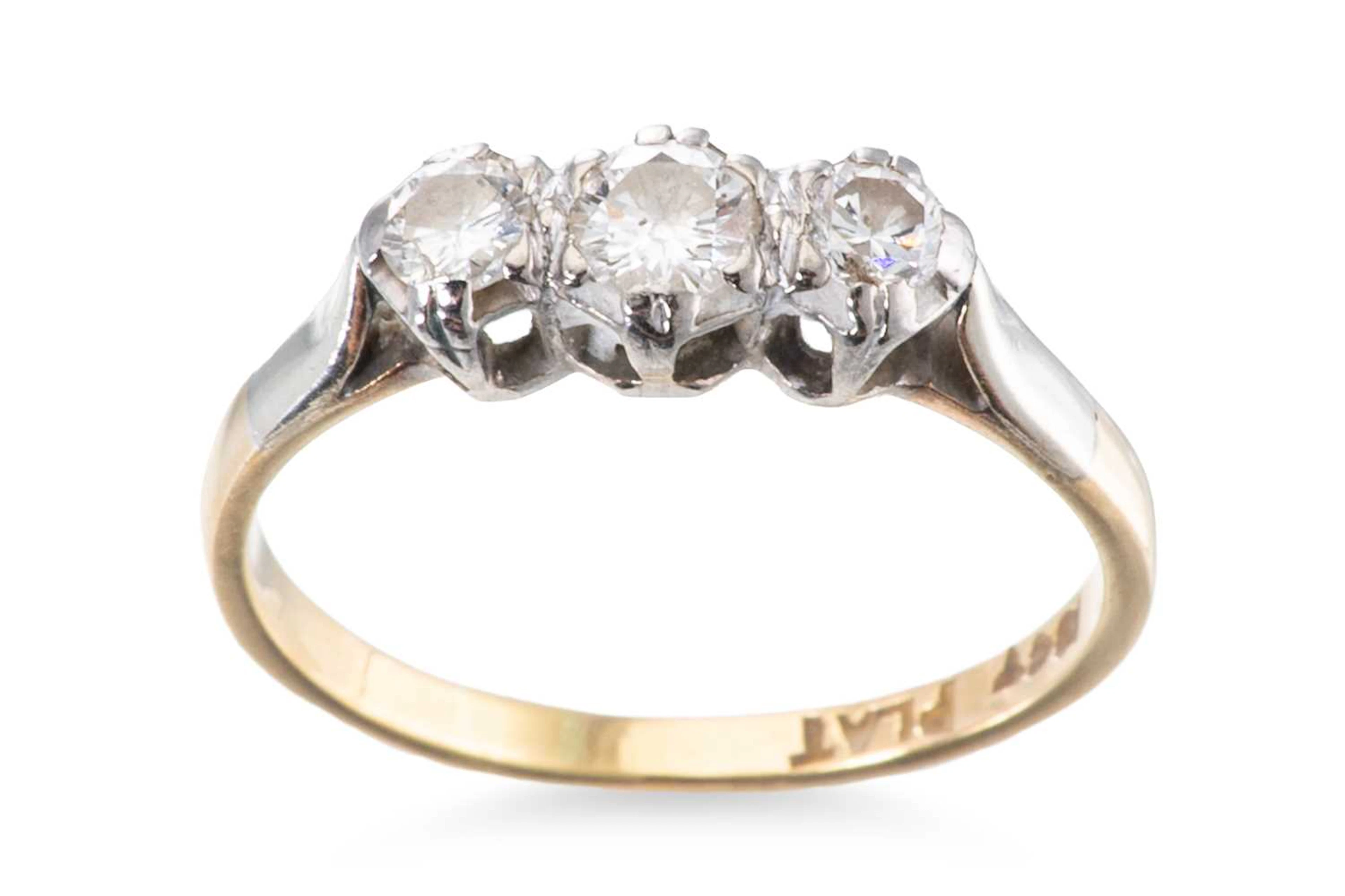 A THREE STONE DIAMOND RING