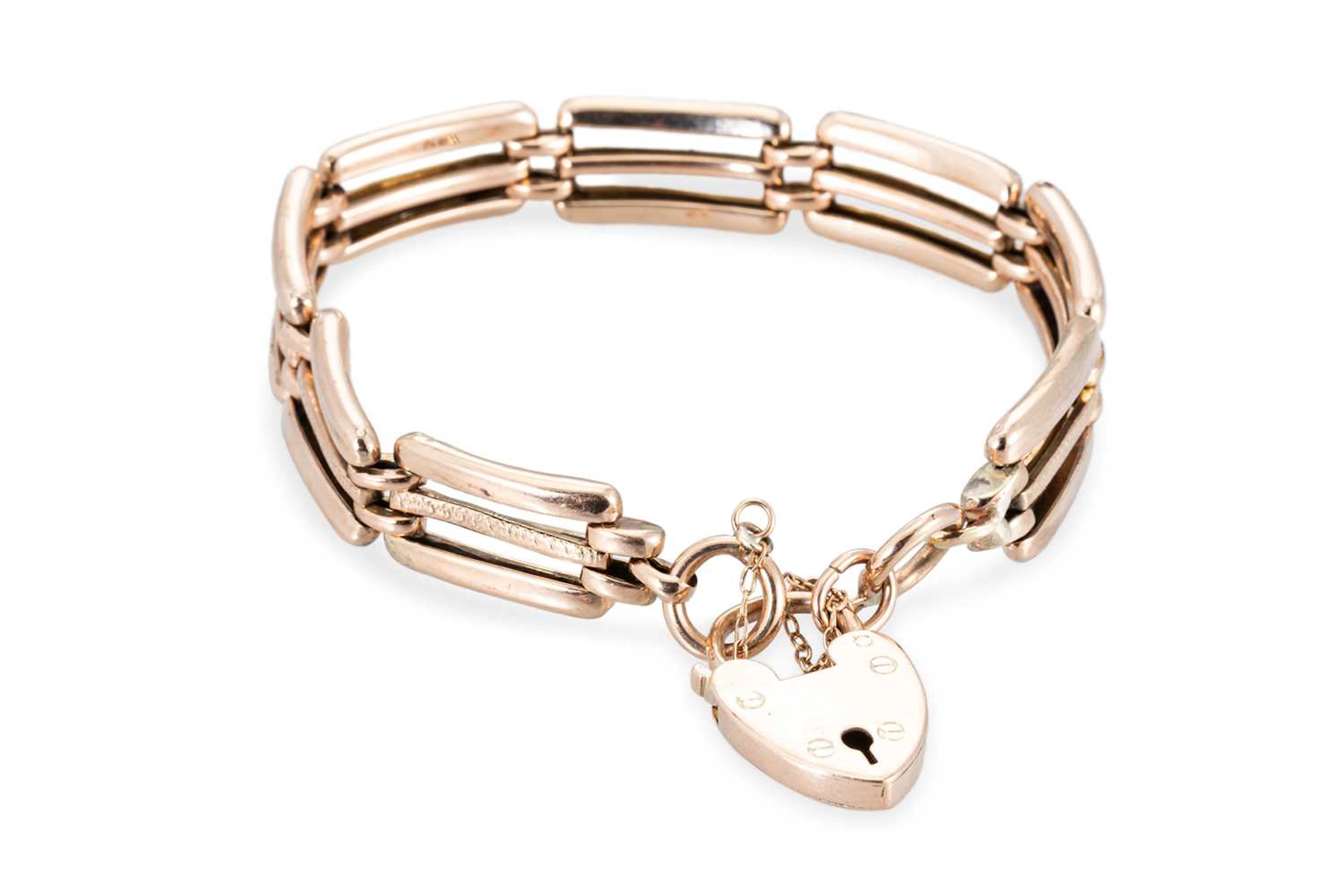 A 9CT VINTAGE THREE BAR GATE BRACELET