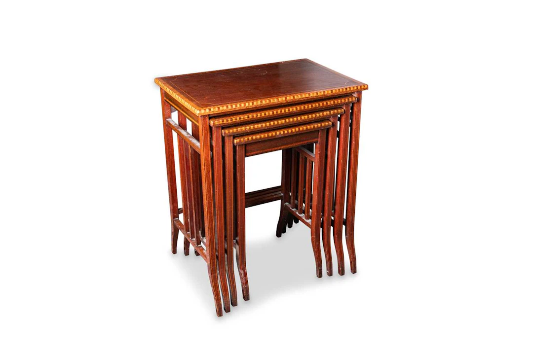A SET OF FOUR EDWARDIAN NESTING TABLES