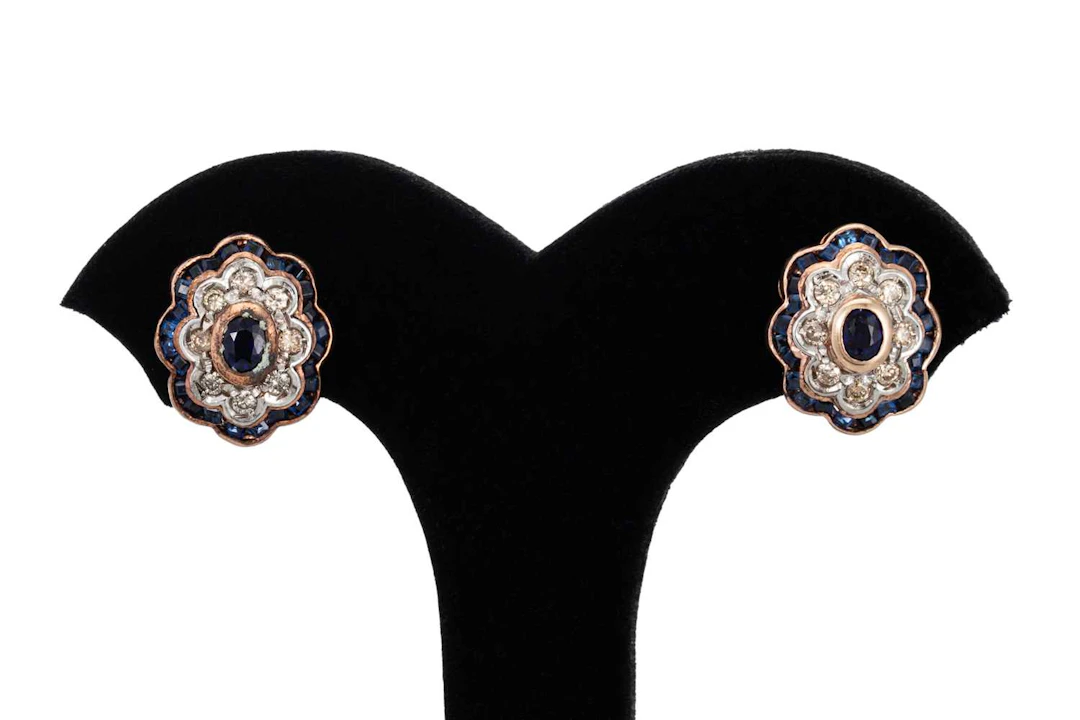 A PAIR OF SAPPHIRE AND DIAMOND CLUSTER EARRINGS