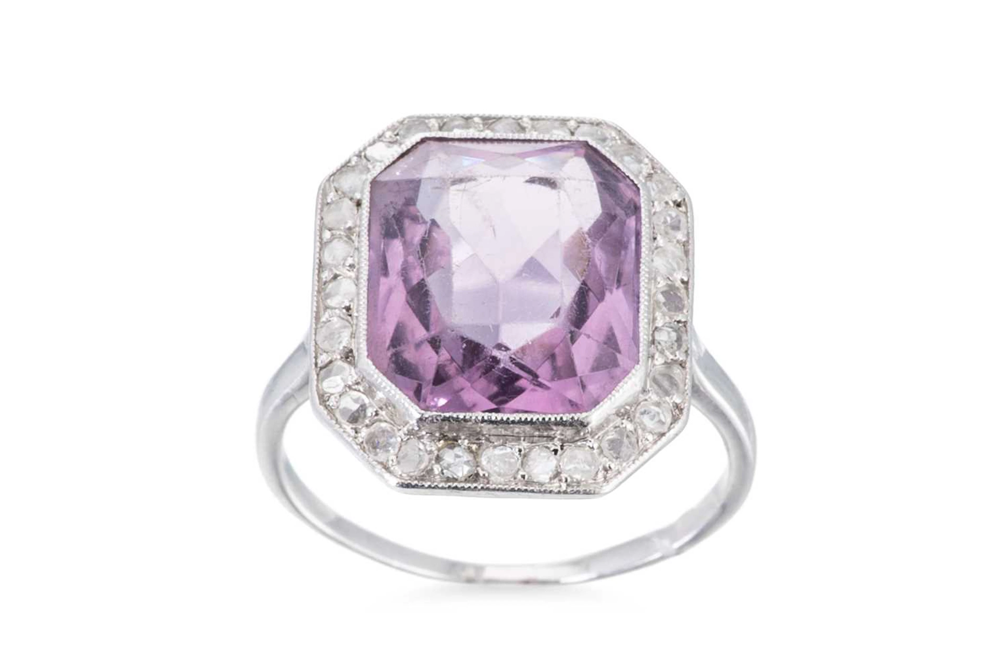A VINTAGE AMETHYST AND DIAMOND CLUSTER RING