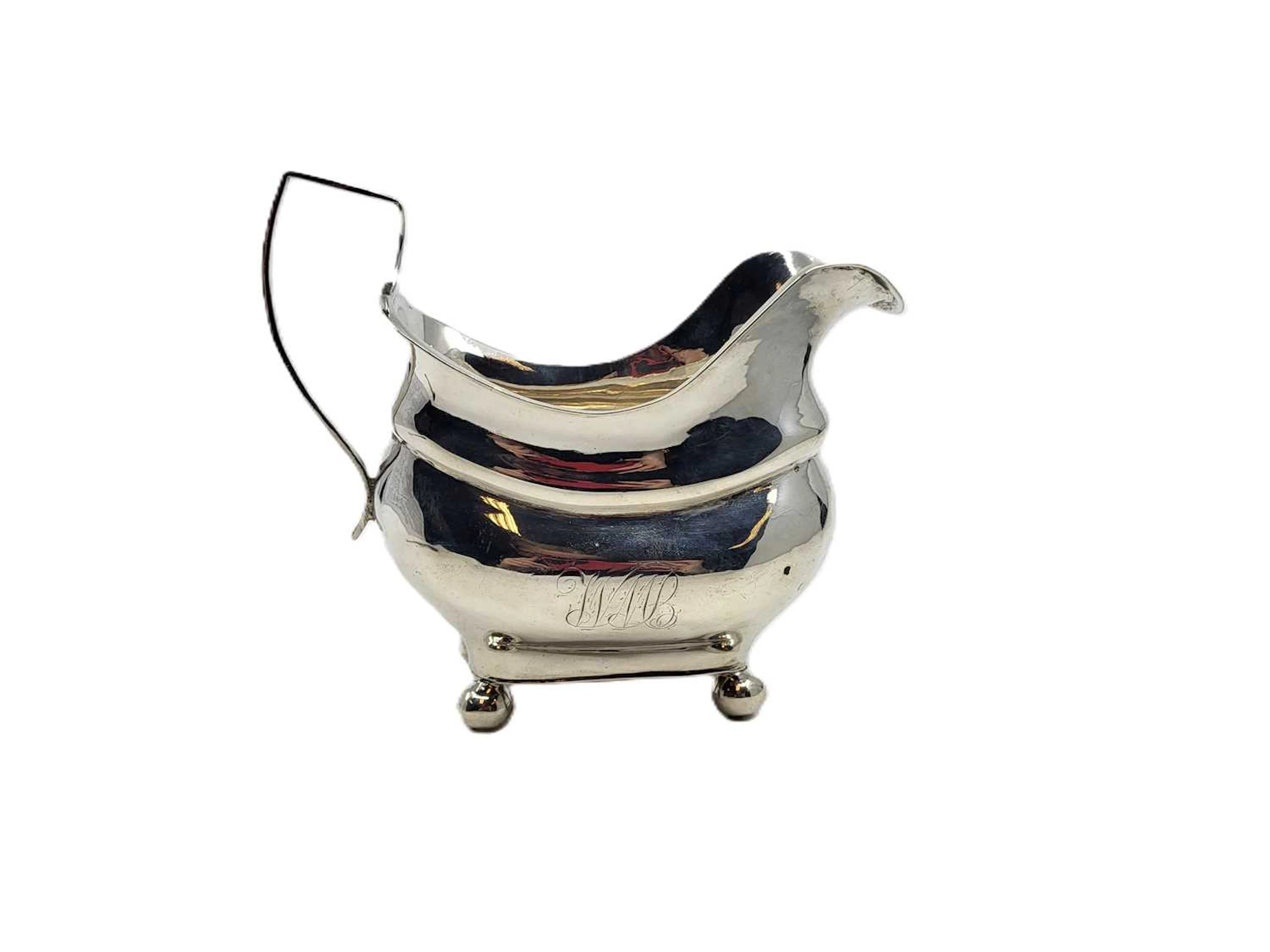 A GEORGE V IRISH SILVER MILK JUG