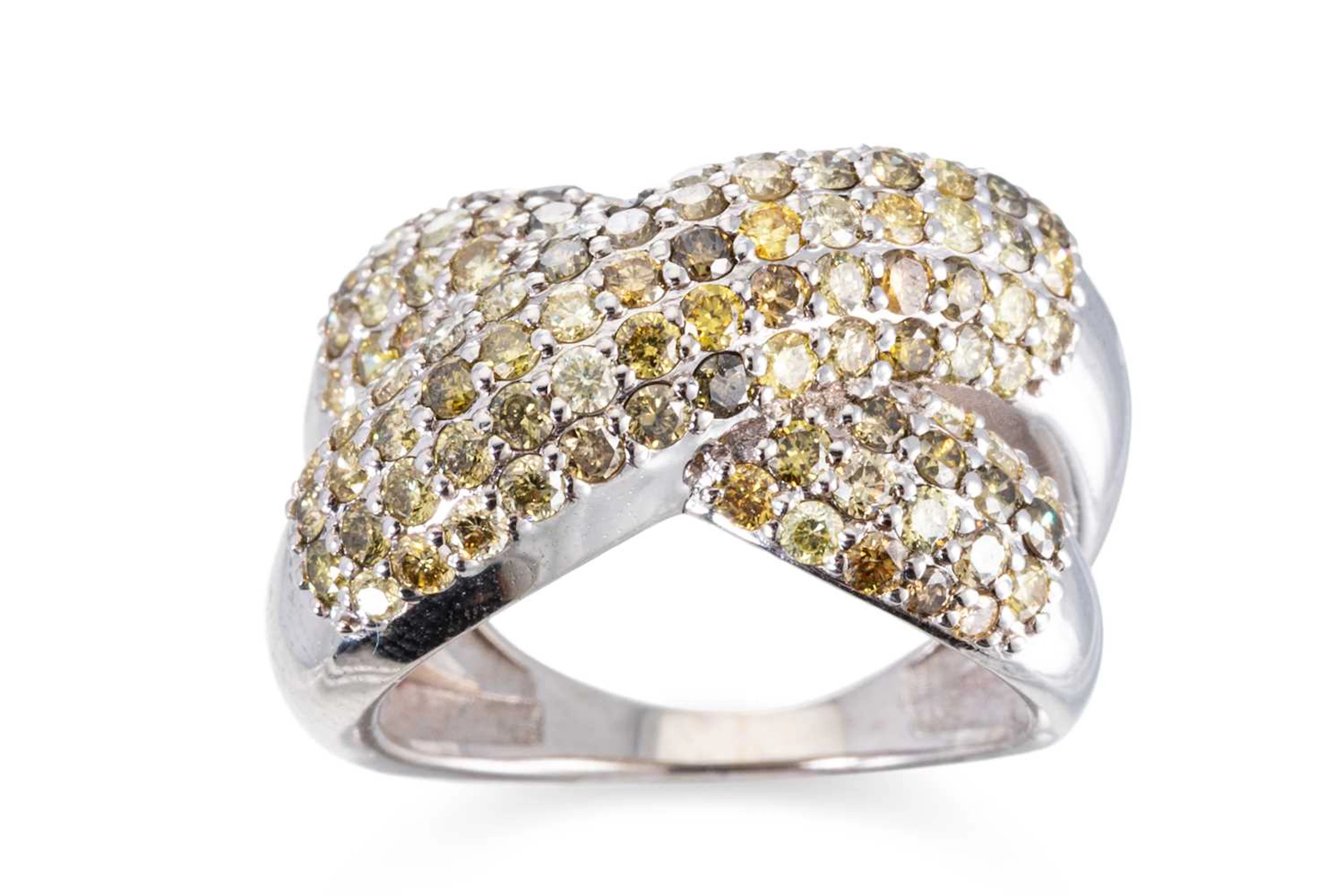 A COLOURED DIAMOND CLUSTER RING