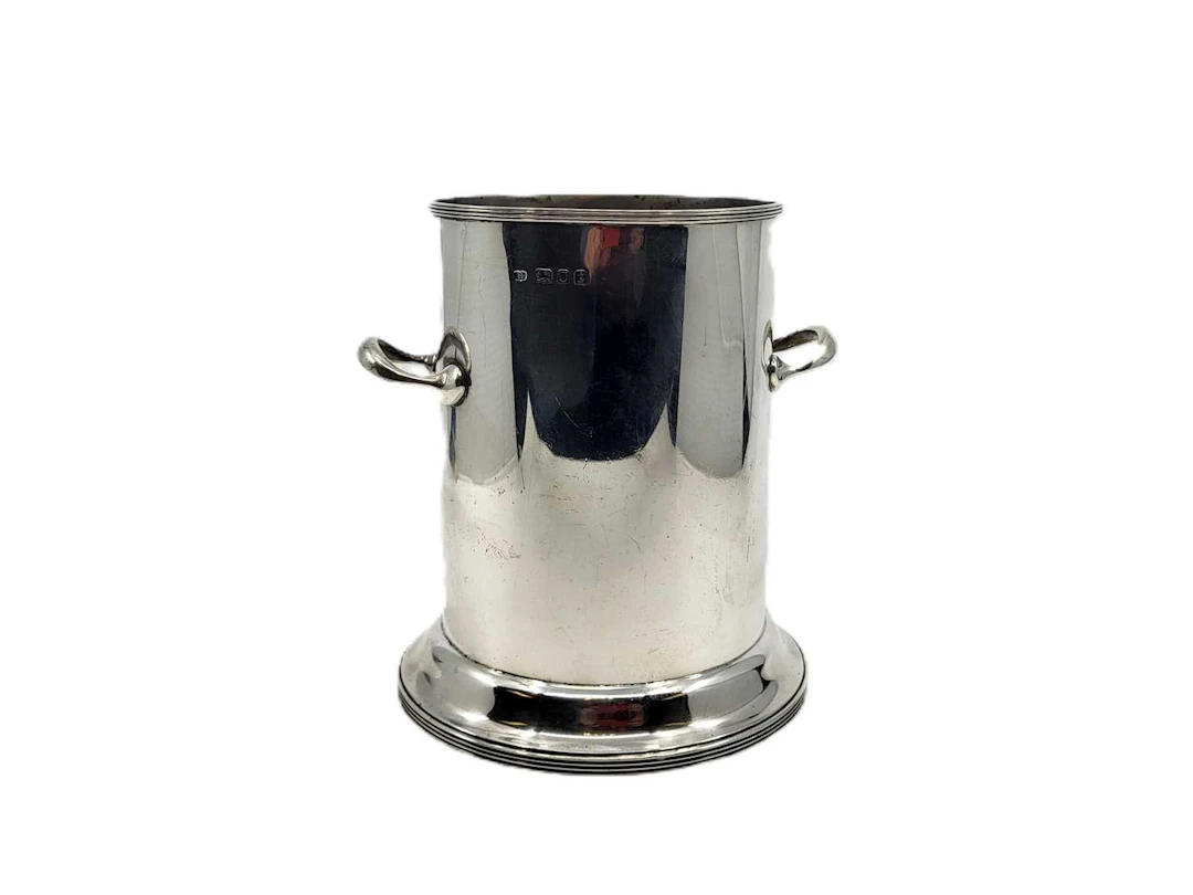 A GEORGE V STERLING SILVER (.925) TALL TWIN HANDLED WINE BOTTLE COOLER
